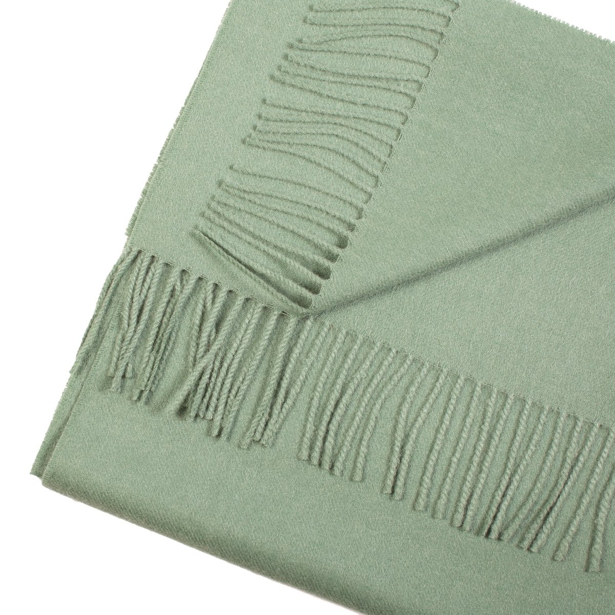 A luxurious light green alpaca wool scarf, showcasing its soft texture and elegant design, perfect for winter wear.