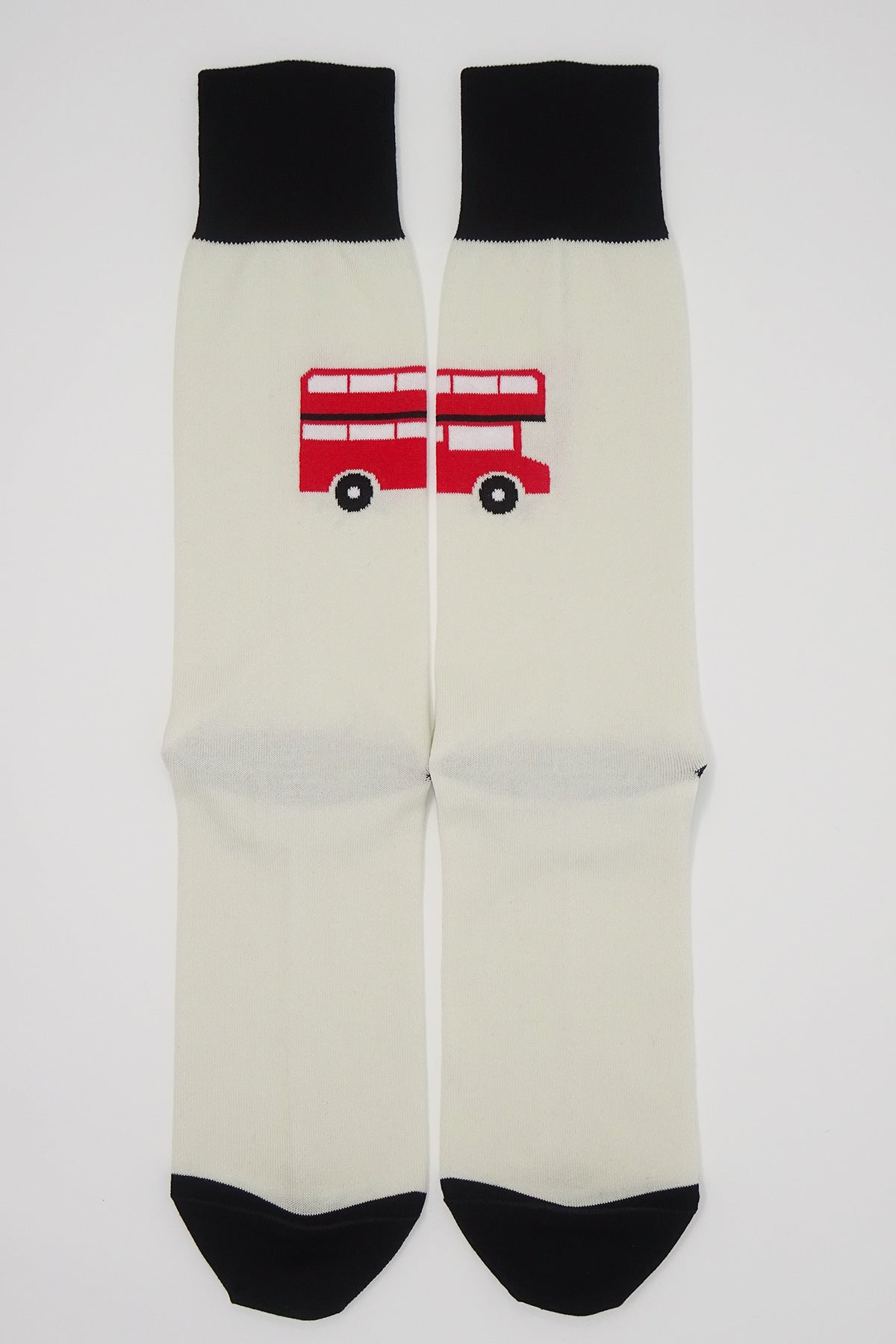 Cream men's socks featuring an iconic London red bus design, showcasing luxury and style.