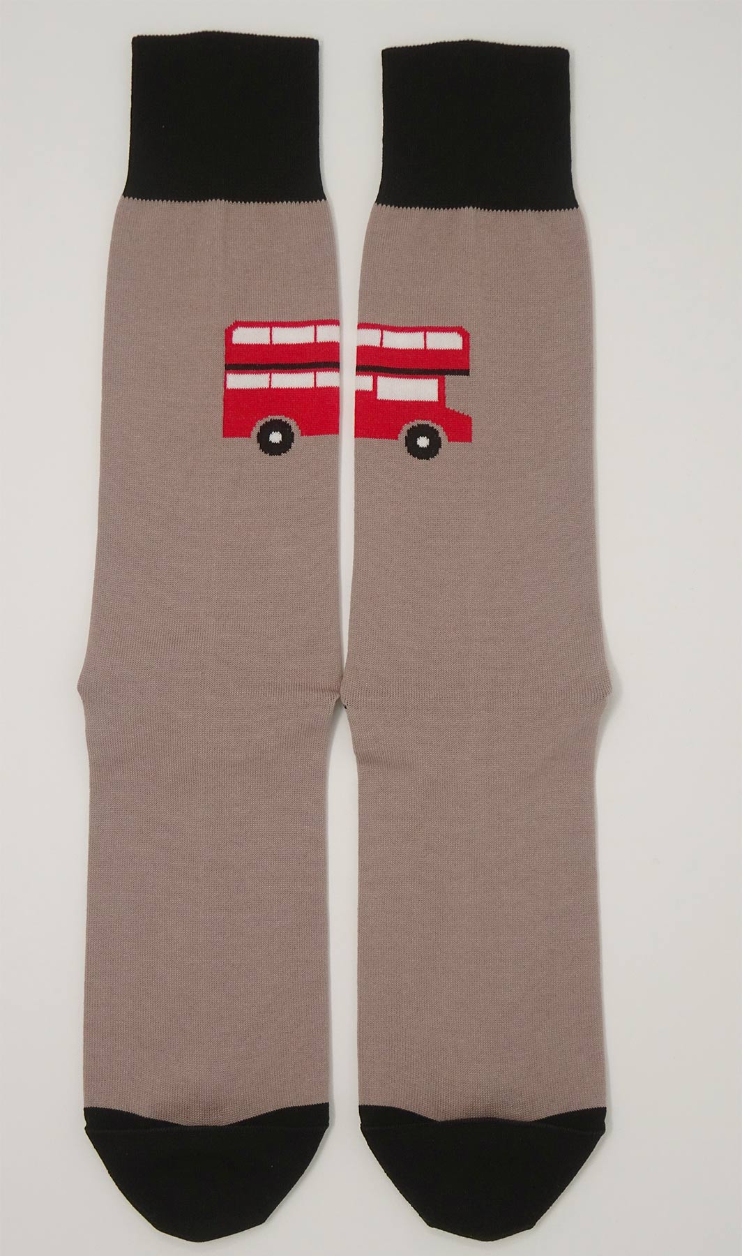 Luxury men's socks featuring the iconic London red bus design on a mink background, showcasing premium craftsmanship.