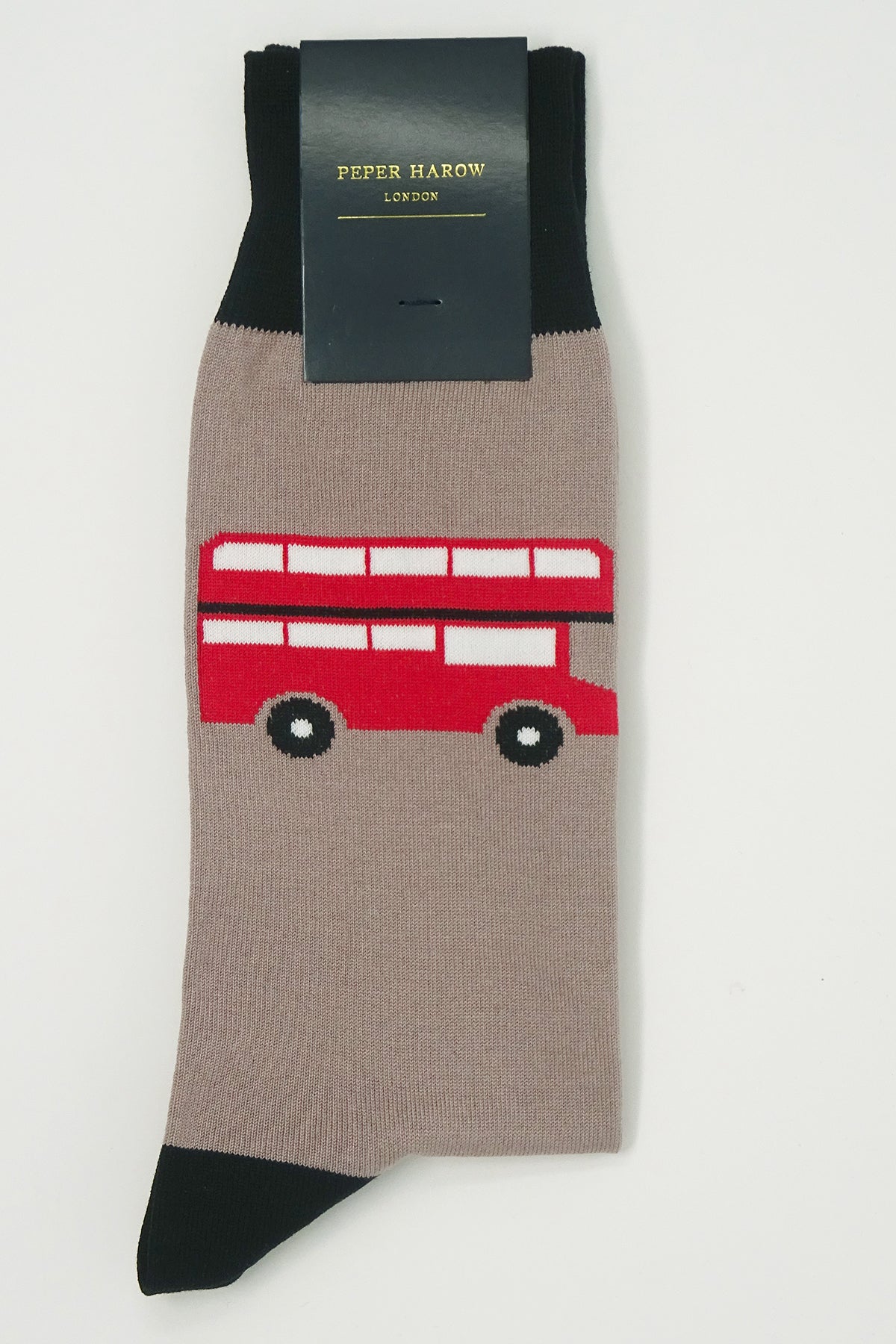 Luxury men's socks featuring the iconic London red bus design on a mink background, showcasing premium craftsmanship.