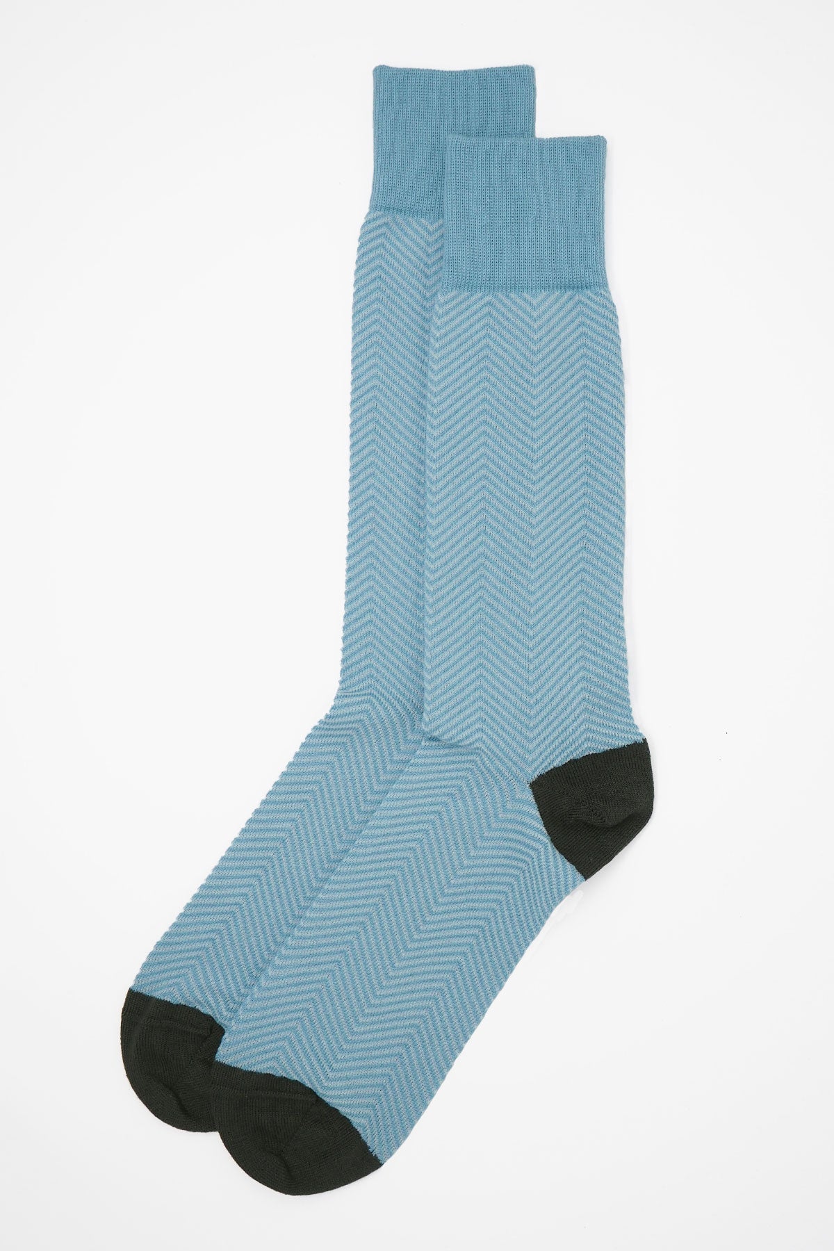 Lux Taylor Men's Socks in sky blue with white zigzag pattern and black heel and toe, showcasing luxury and style.