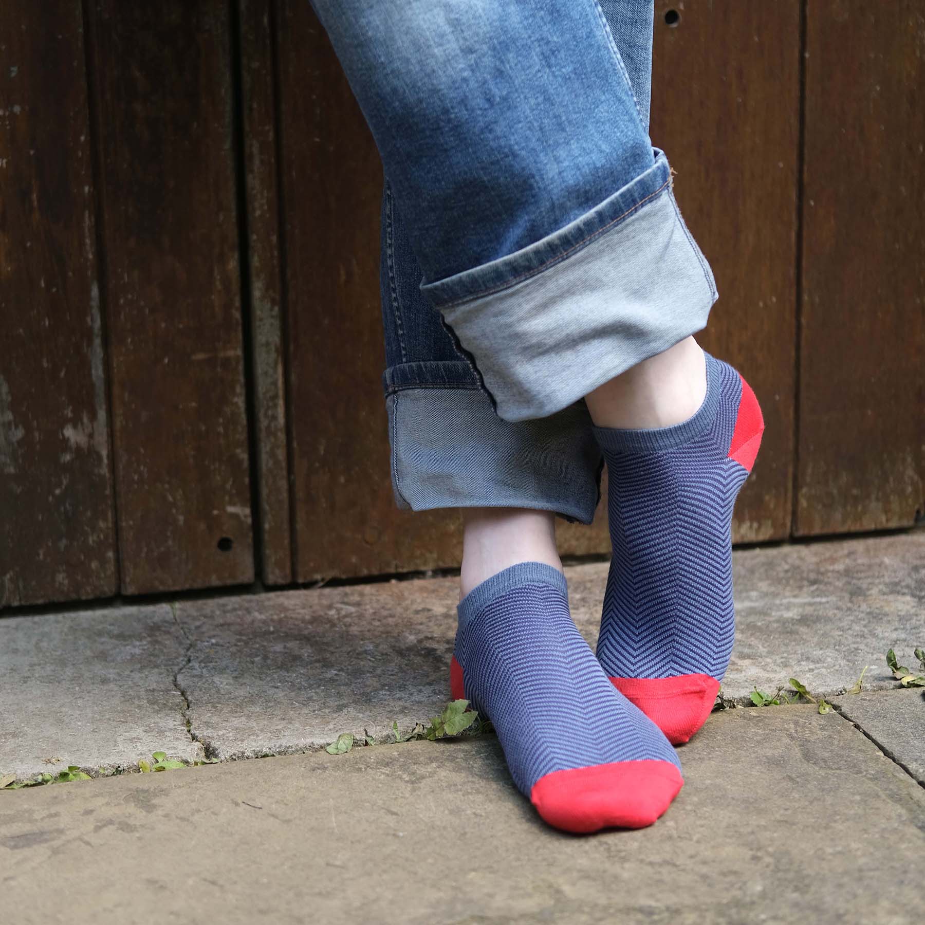 Lux Taylor Men's Trainer Socks in blue with navy zigzag pattern and red heel and toe, showcasing luxury and style.