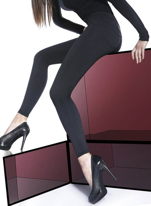 A pair of black MARIKA classic opaque leggings for women, showcasing their thick fabric and stylish design.