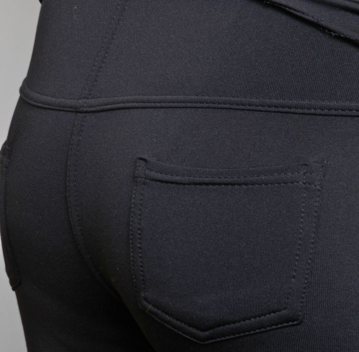 A pair of black MARIKA classic opaque leggings for women, showcasing their thick fabric and stylish design.