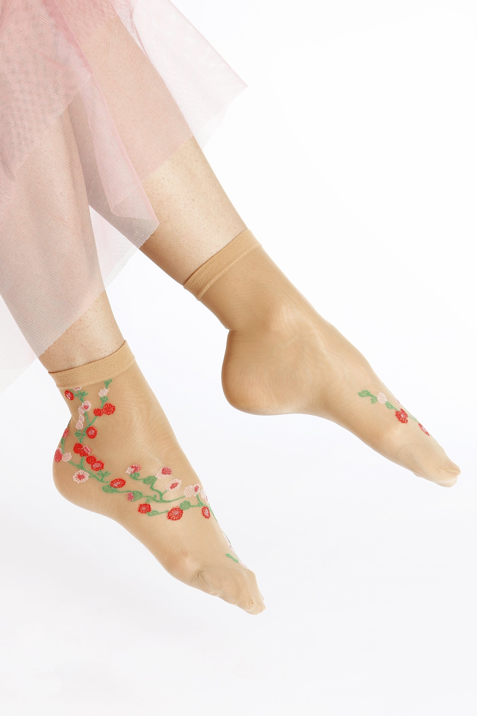 MARISSA sheer beige socks for women with floral pattern, showcasing elegance and comfort.