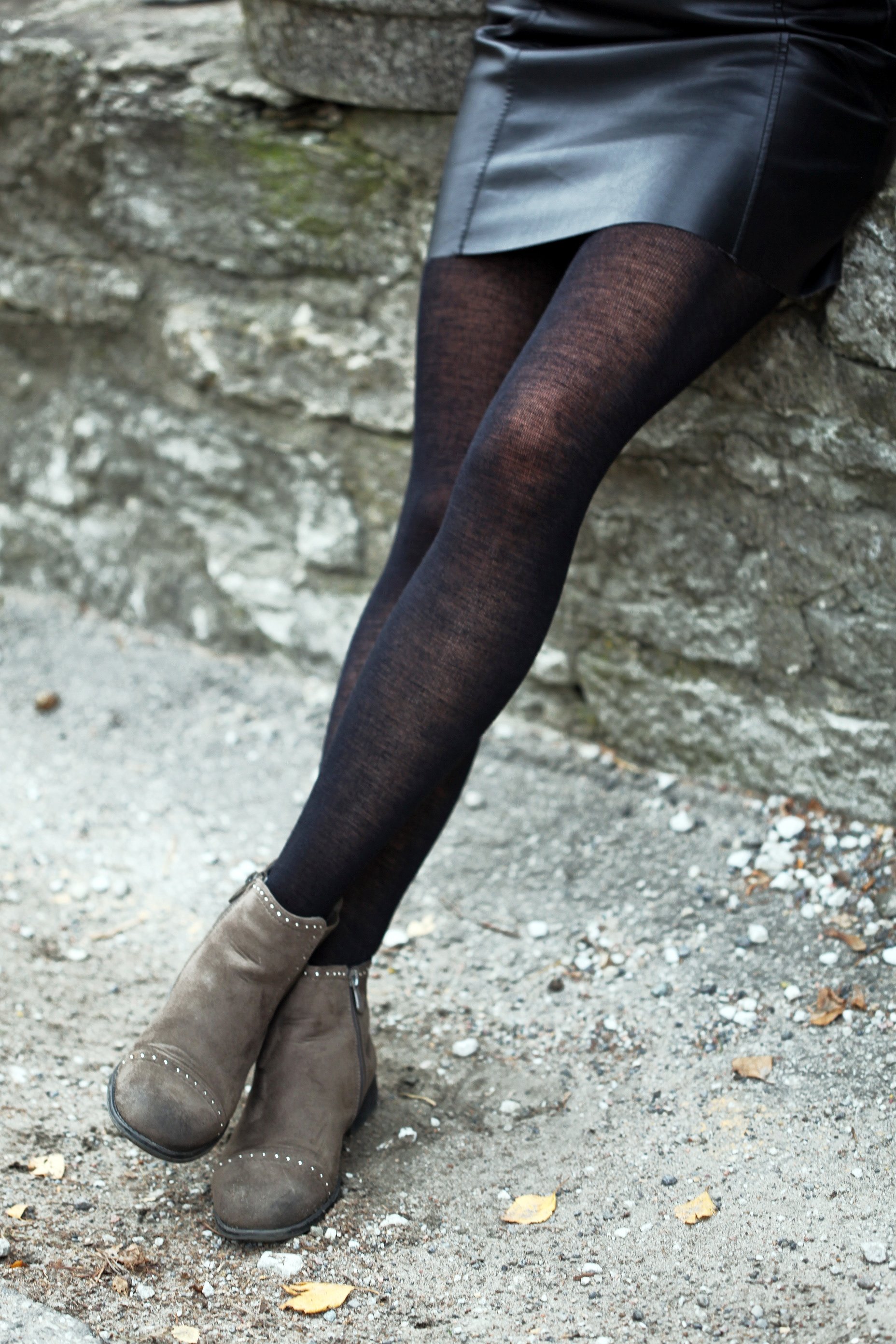 MILANA black merino tights displayed elegantly, showcasing their thin and warm design, perfect for women's fashion.