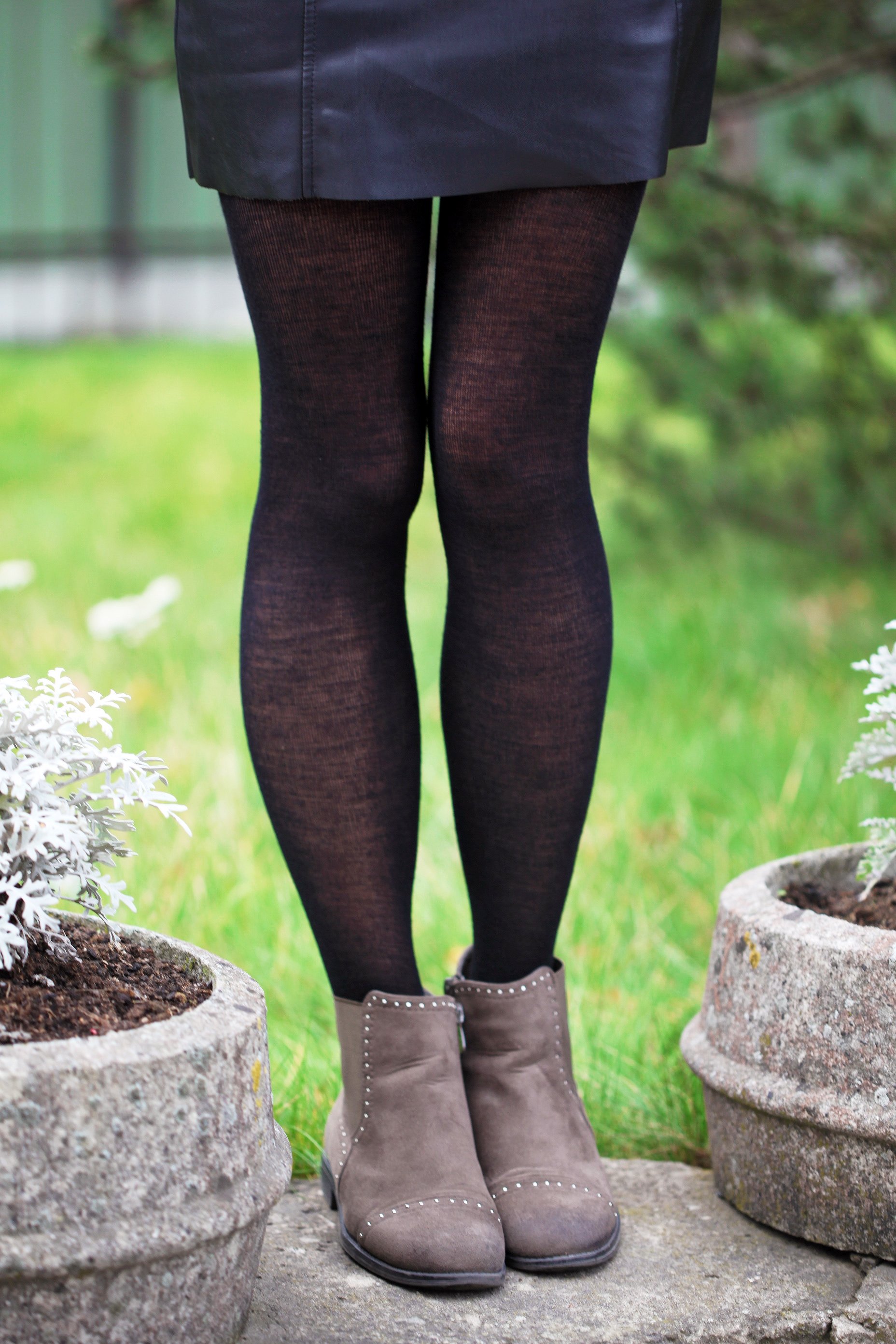 MILANA black merino tights displayed elegantly, showcasing their thin and warm design, perfect for women's fashion.