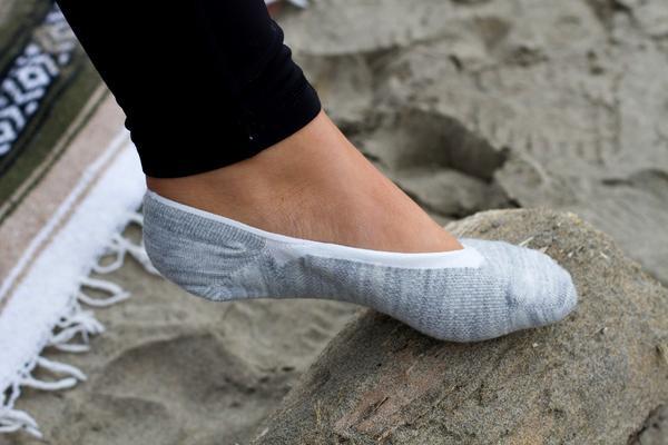 A pair of no-show alpaca socks showcasing their soft texture and hidden design, perfect for comfort and breathability.