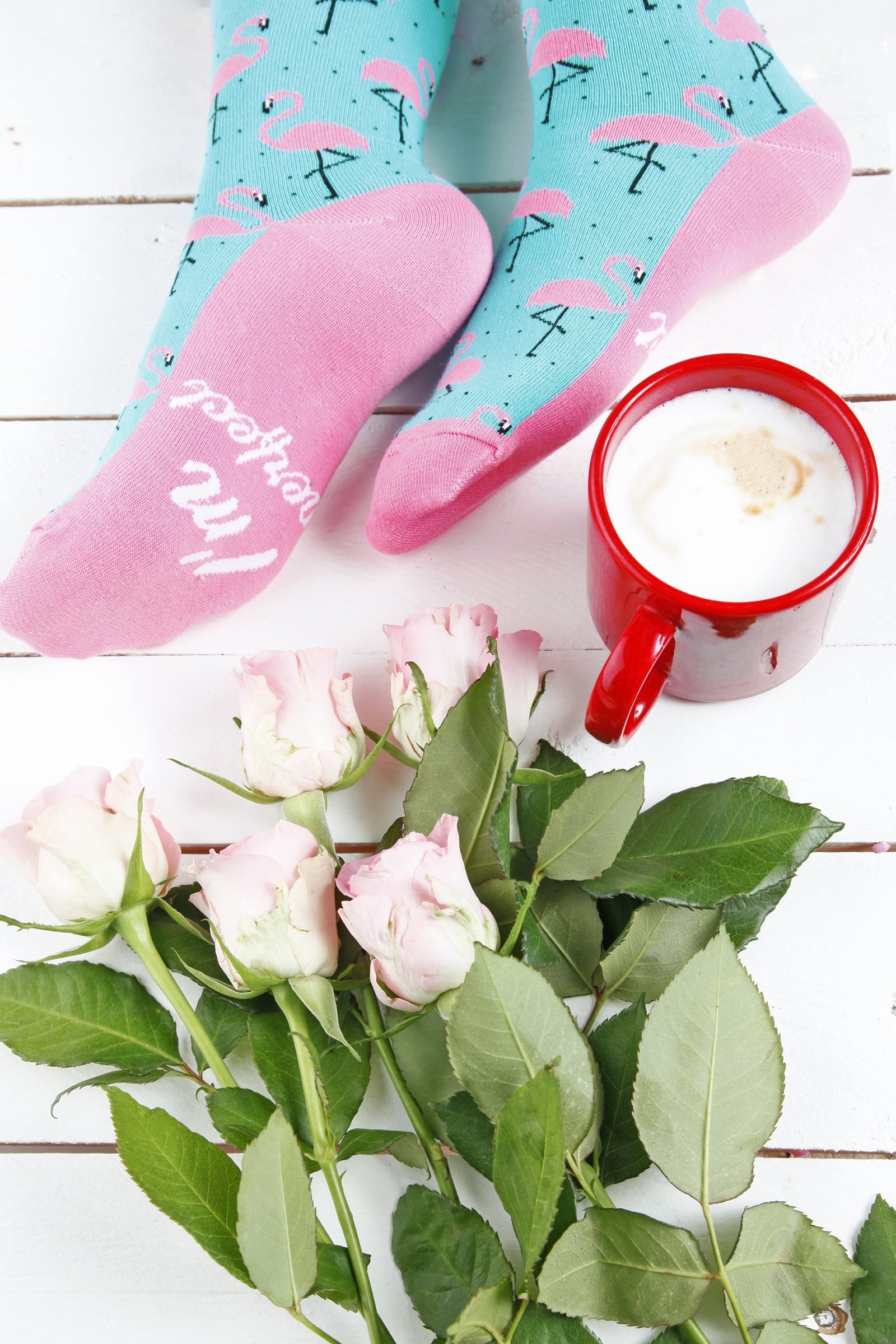 Light blue cotton socks for women featuring a flamingo pattern and the text 'I'm perfect' on the sole.