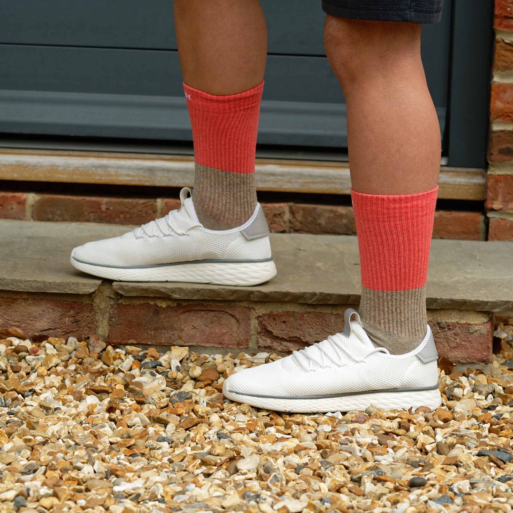 Coral Recycled Men's Sport Socks with cushioned sole and seamless toe design, showcasing eco-friendly materials.