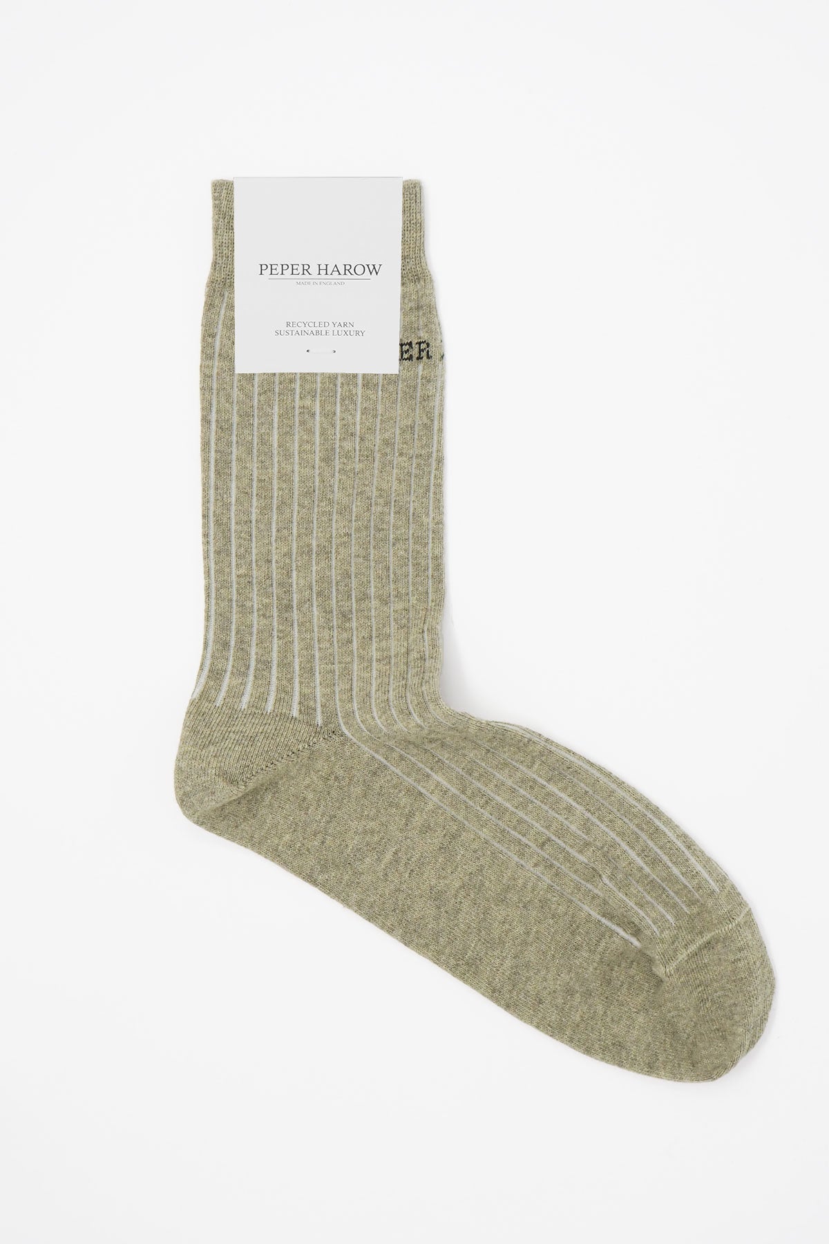 Beige recycled ribbed women's socks displayed elegantly, showcasing their eco-friendly design and soft texture.