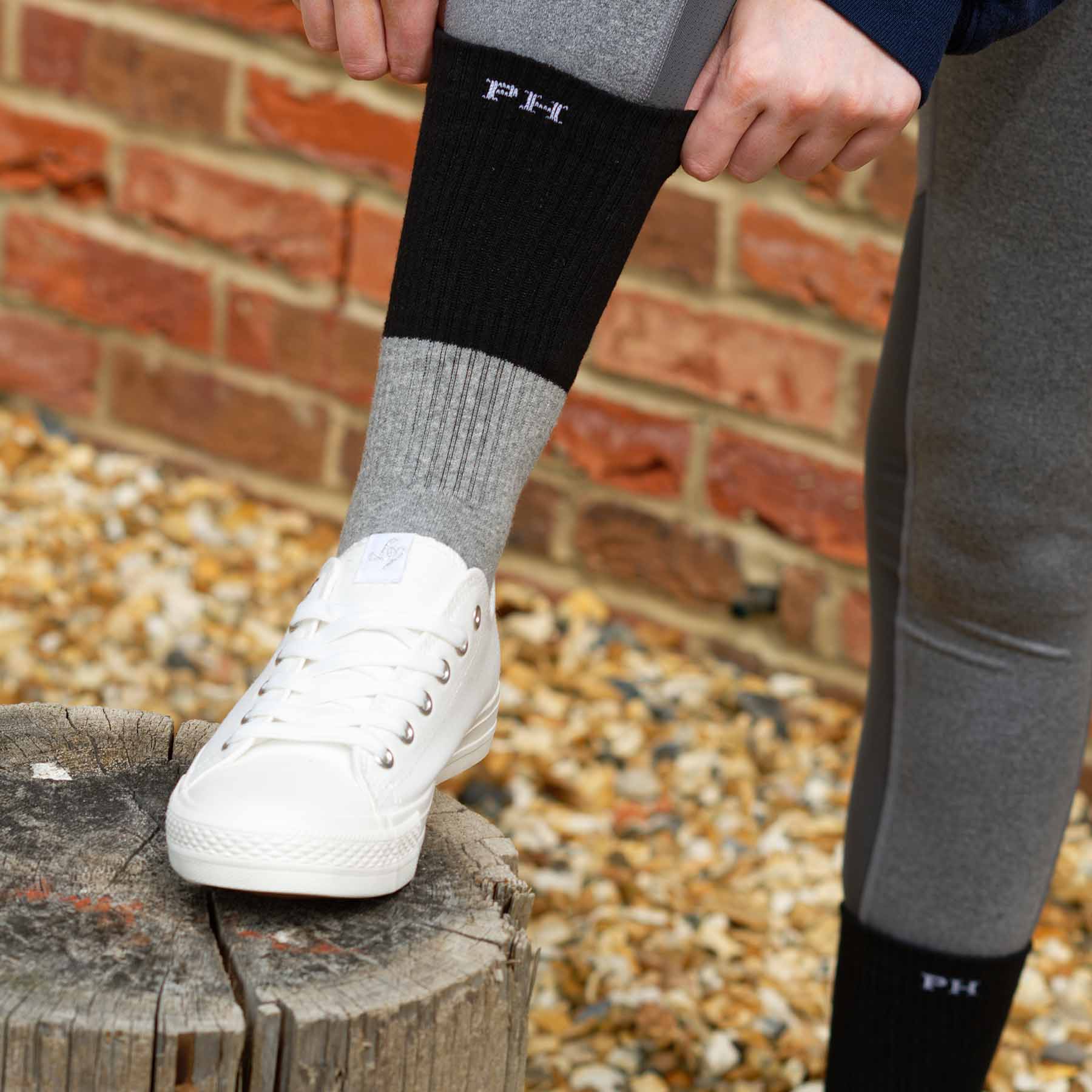 Black Recycled Women's Sport Socks with cushioned sole and seamless toe design, showcasing eco-friendly materials.