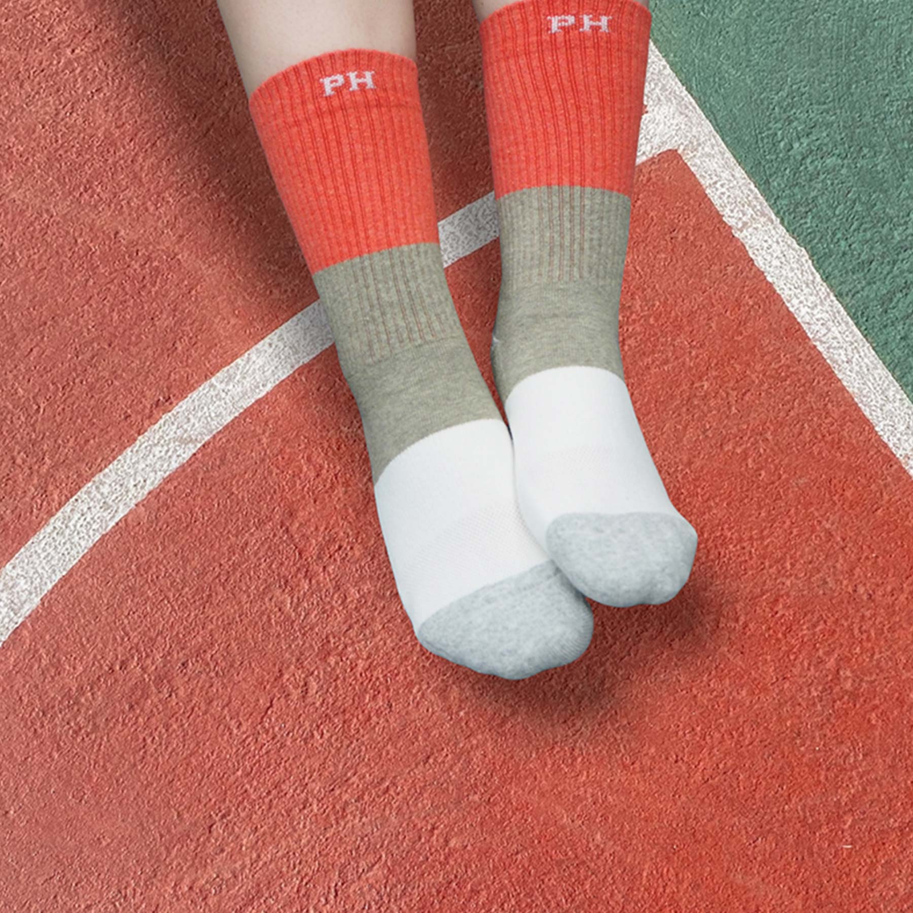 Coral Recycled Women's Sport Socks with cushioned sole and seamless toe design, showcasing eco-friendly materials.