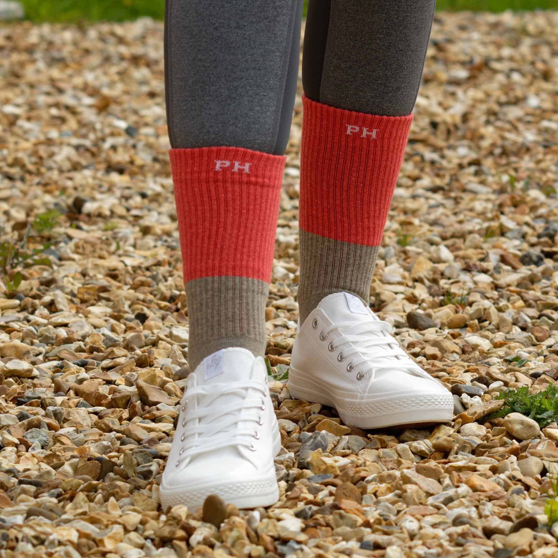 Coral Recycled Women's Sport Socks with cushioned sole and seamless toe design, showcasing eco-friendly materials.