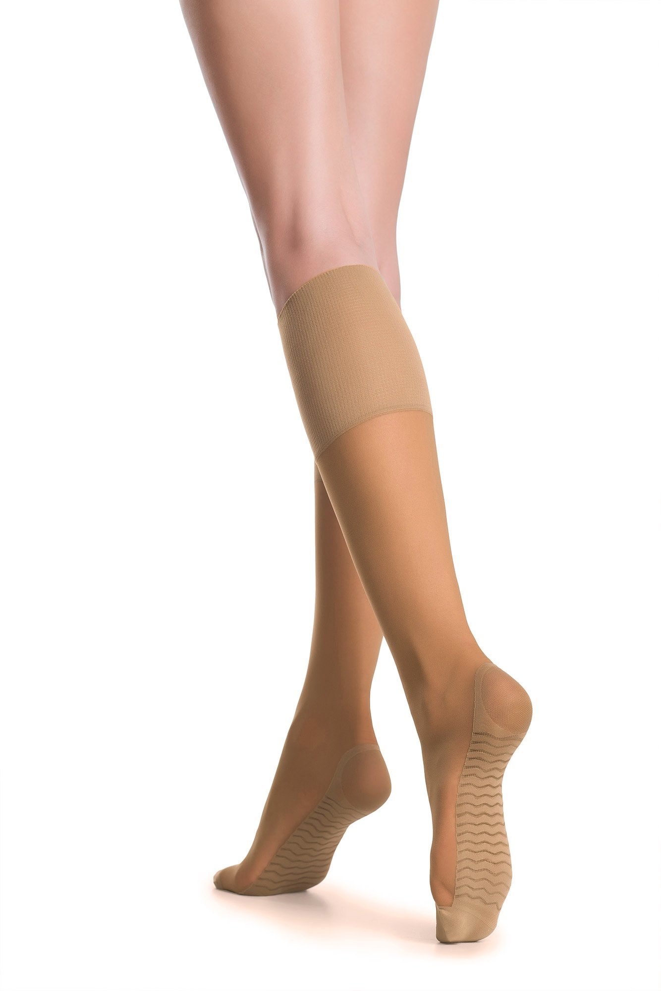 A pair of RELAX 20 DEN natural knee-highs in beige, showcasing their soft fabric and wide ribbing design.