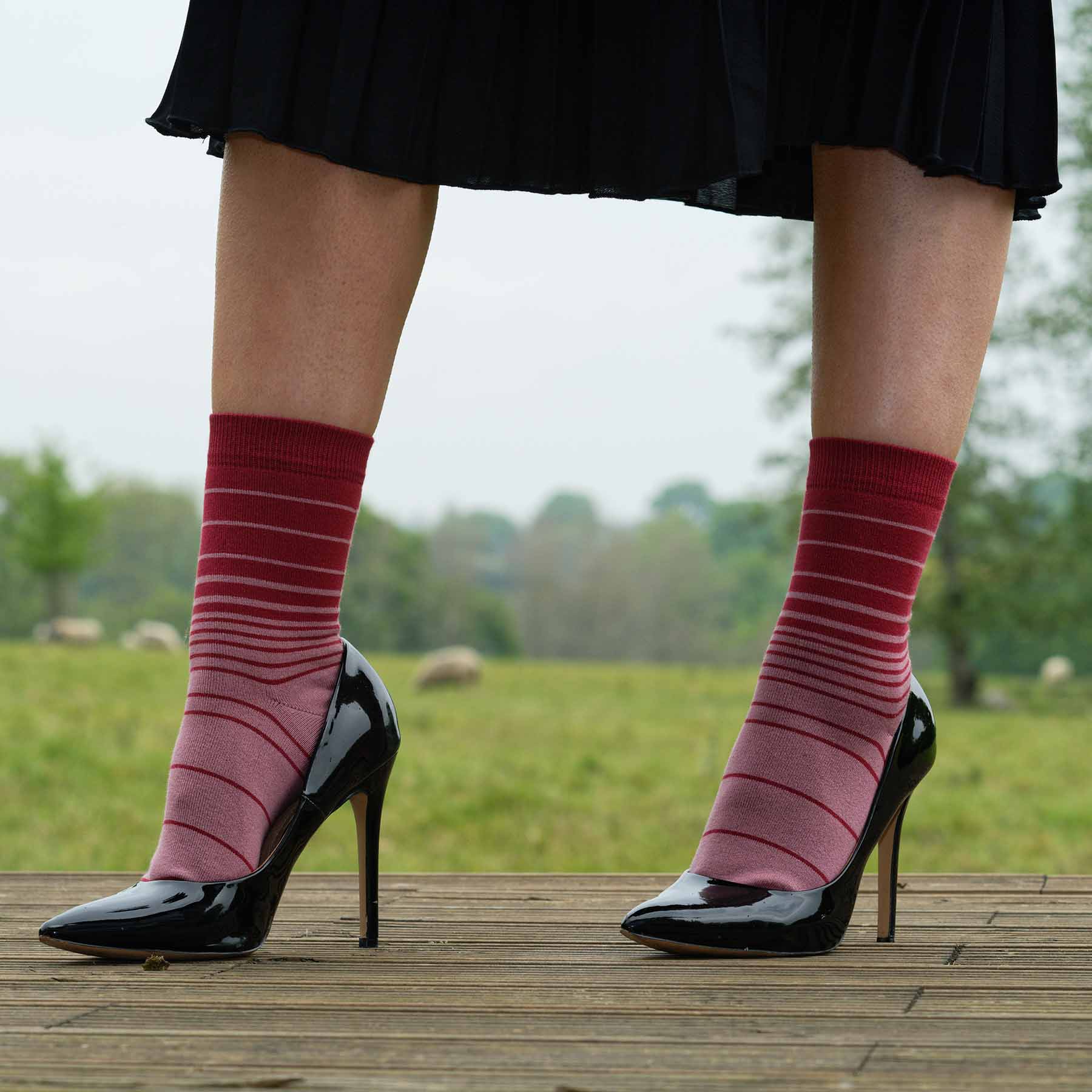 Retro Stripe Women's Socks in musk with red and musk stripes, showcasing luxurious Supima cotton and seamless toe design.