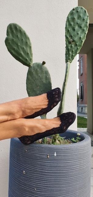 RICCA black footsies featuring a lace pattern and silicone inner layer for comfort and secure fit.