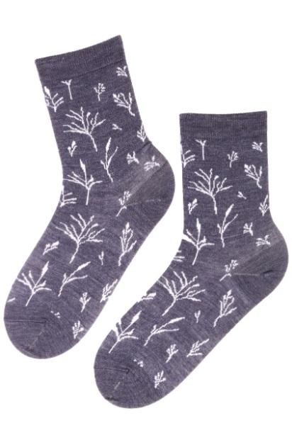 A pair of SEASIDE merino socks for women in grey with a stylish branch pattern, showcasing their soft texture and quality material.