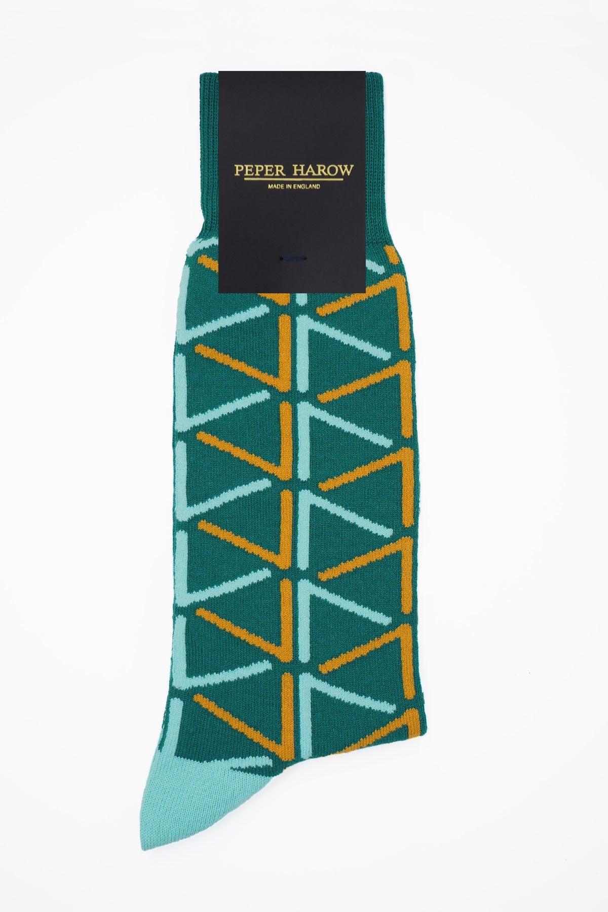 A pair of teal men's luxury socks featuring contrasting blue and yellow patterns, made from Supima cotton.