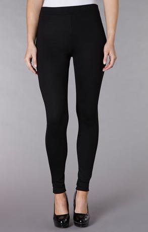 A pair of SHAPE body shaping leggings designed to enhance curves, featuring a sleek black design and a comfortable fit.