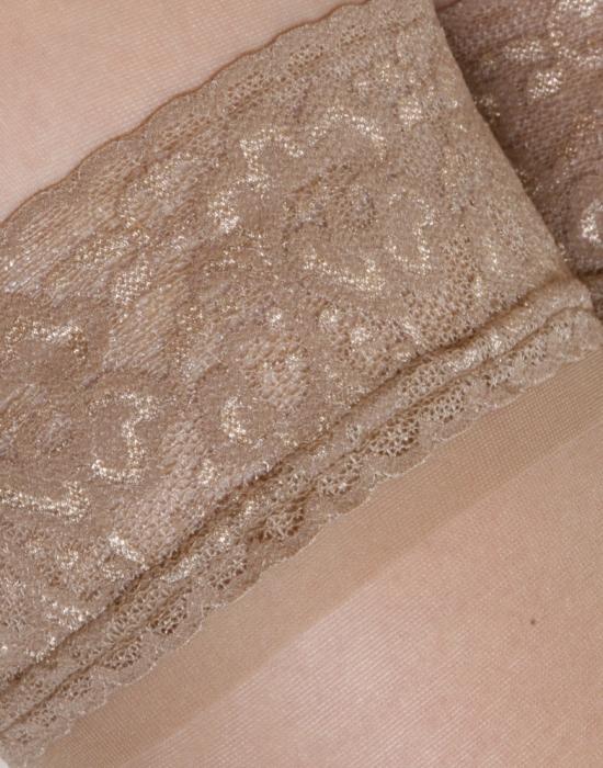 SILVI natural hold-ups for women featuring a sheer design and wide lacy silicone edge in natural/beige color.