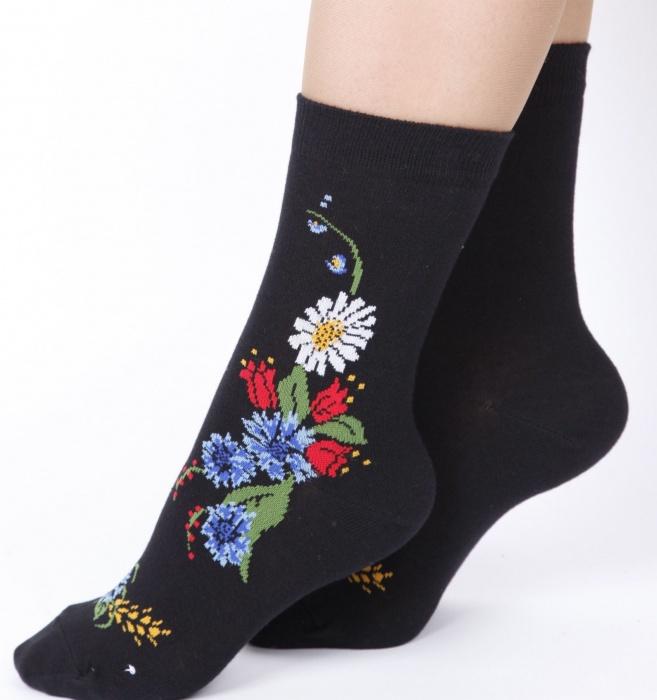 SIRJE cotton socks in black featuring an ethnic flower pattern, showcasing their soft texture and stylish design.