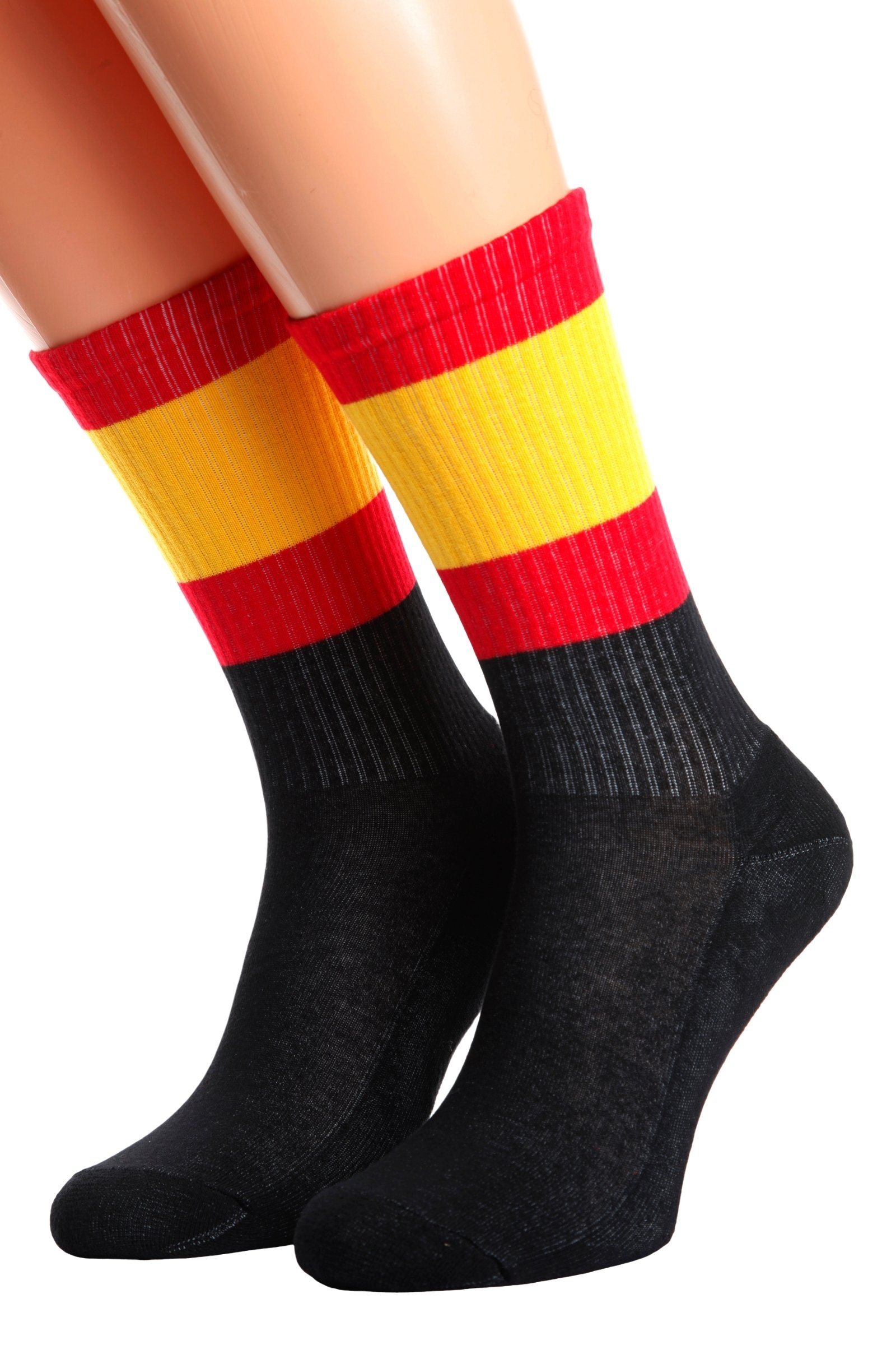 A pair of black cotton socks featuring the vibrant flag of Spain and the word 'SPAIN' on the sole, designed for men and women.