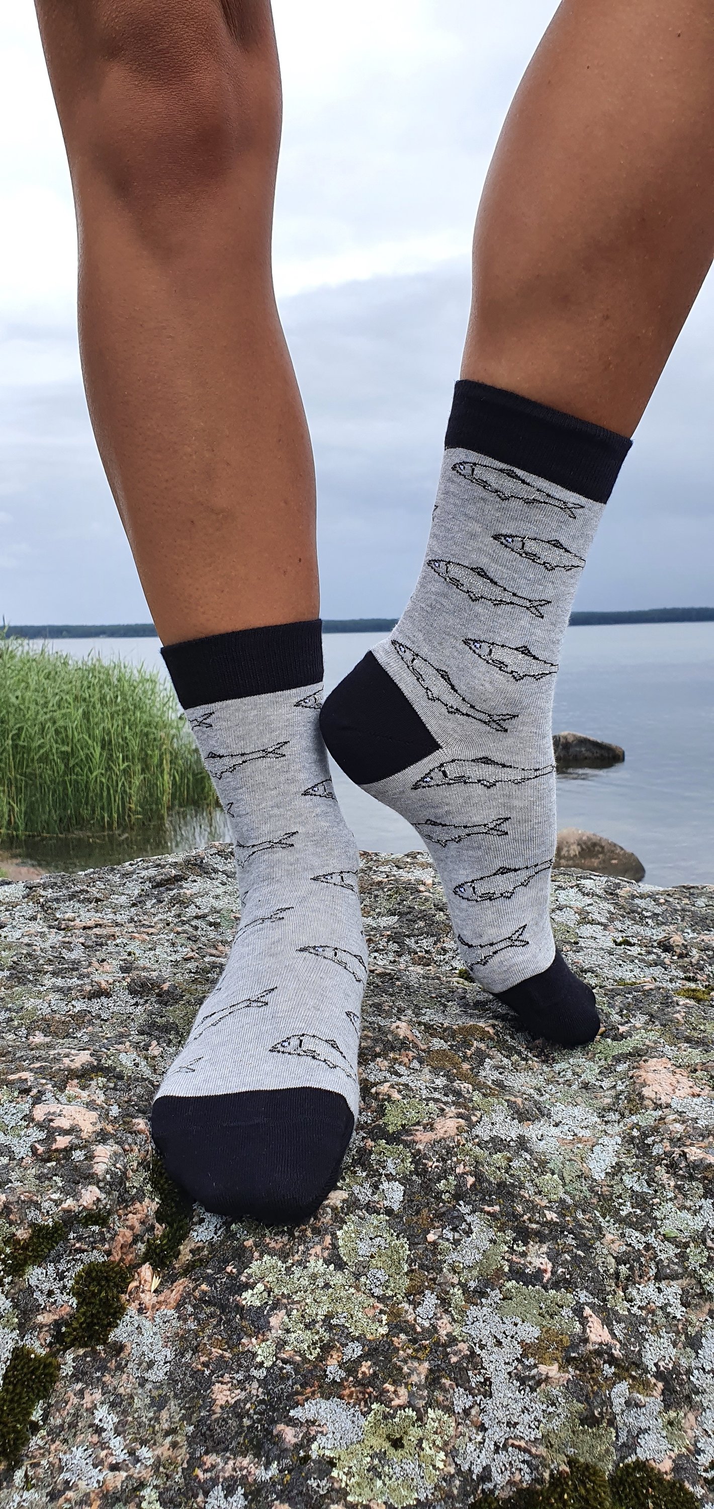 A pair of stylish grey SPRAT cotton socks featuring shiny Lurex thread, inspired by the silver sprat fish.