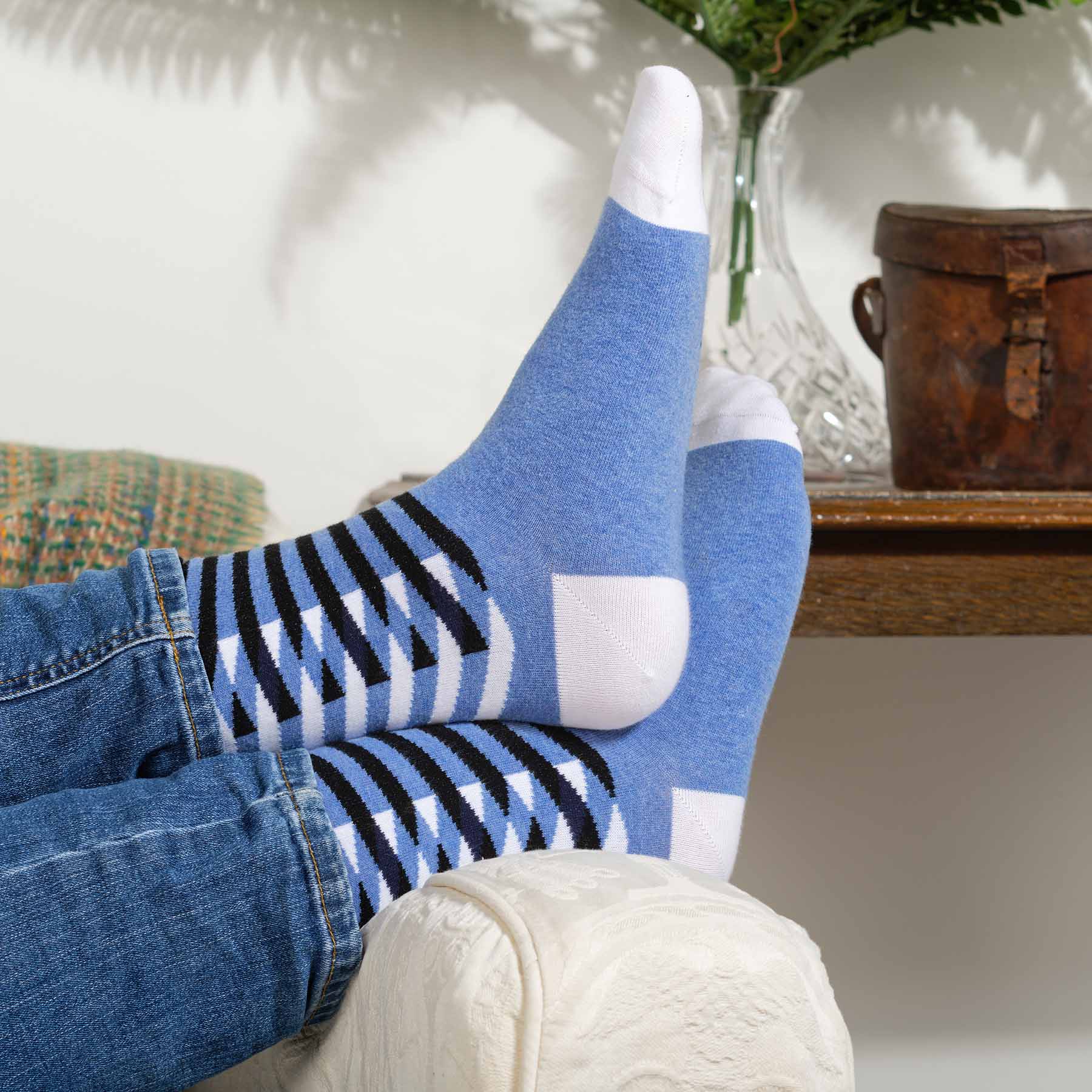 Symmetry Organic Men's Socks in blue with white and black stripes, showcasing a stylish and sustainable design.