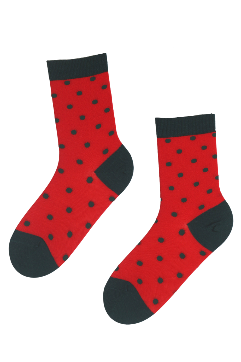 TAMPERE merino wool socks in vibrant red with dark green dots, showcasing their stylish design and high-quality material.