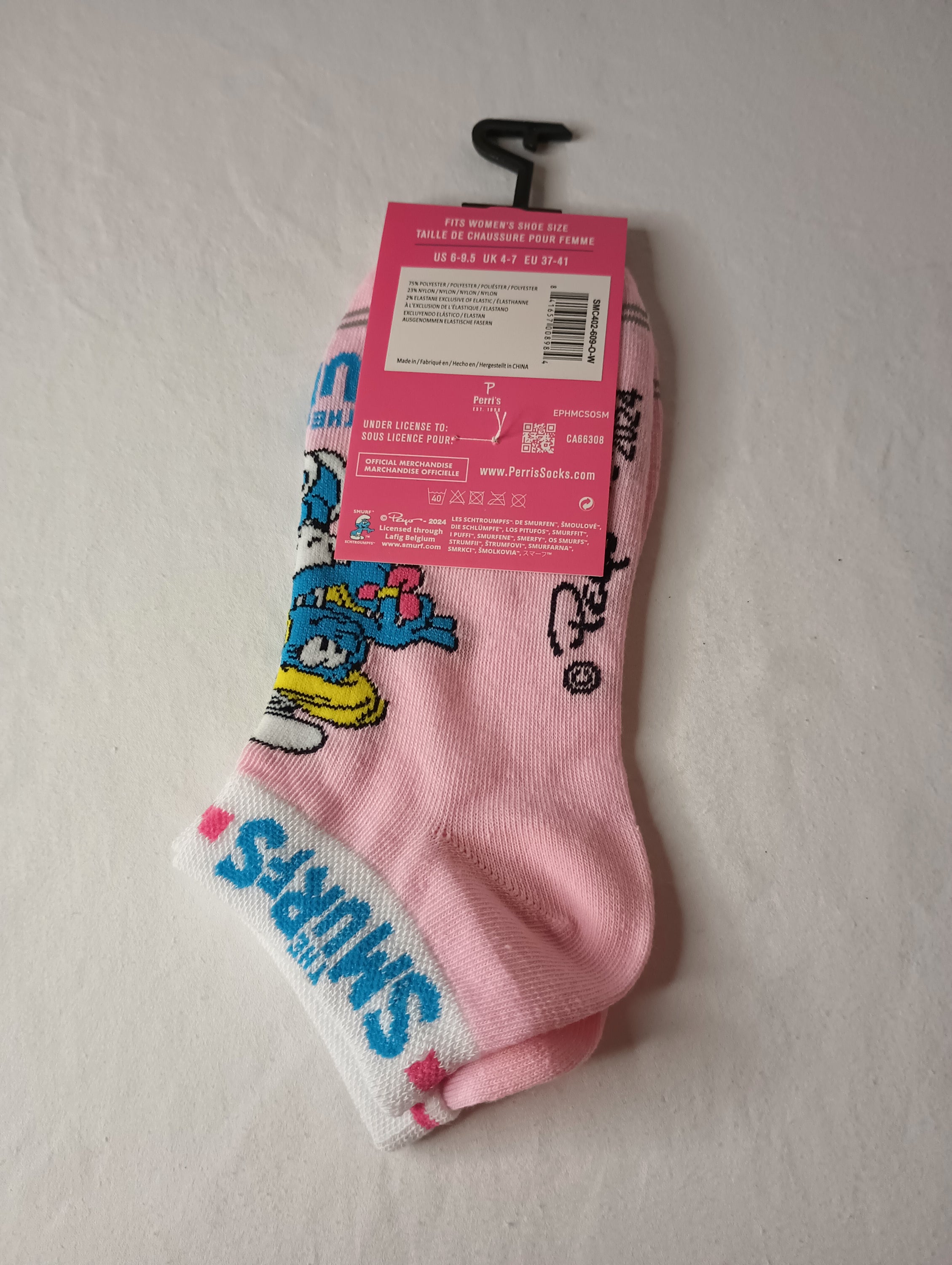 A pair of pink multi The Smurfs ankle socks featuring colorful designs of Smurfs characters, suitable for women's shoe sizes 6-9.5.