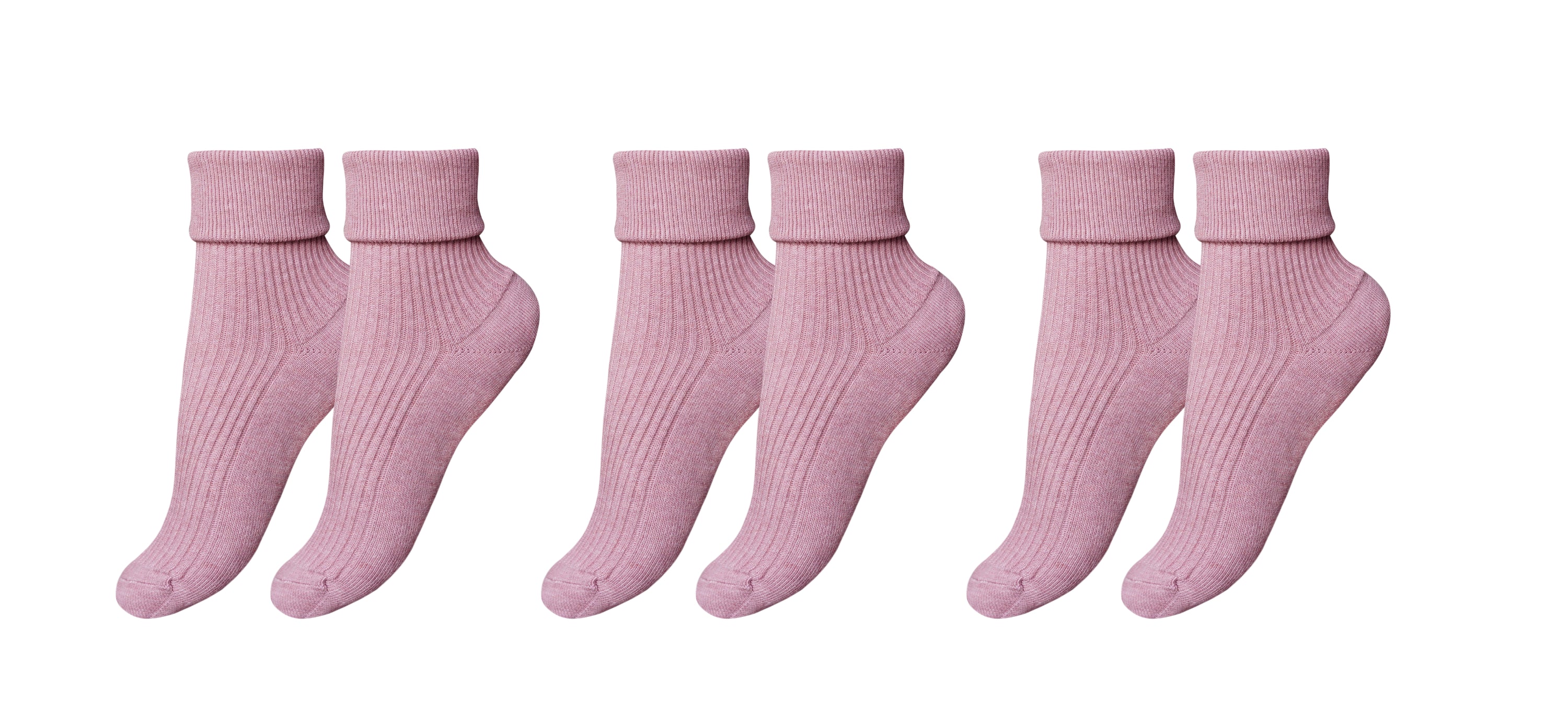 A pack of three pairs of tittimitti® luxury women's socks made from 100% organic combed cotton, showcasing various colors and textures.