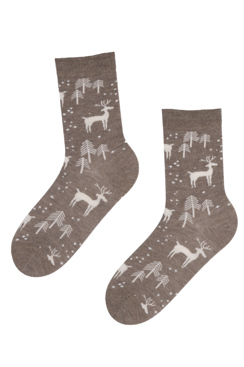 A pair of brown angora wool socks featuring a cute white pattern of elk and fir trees, perfect for winter wear.