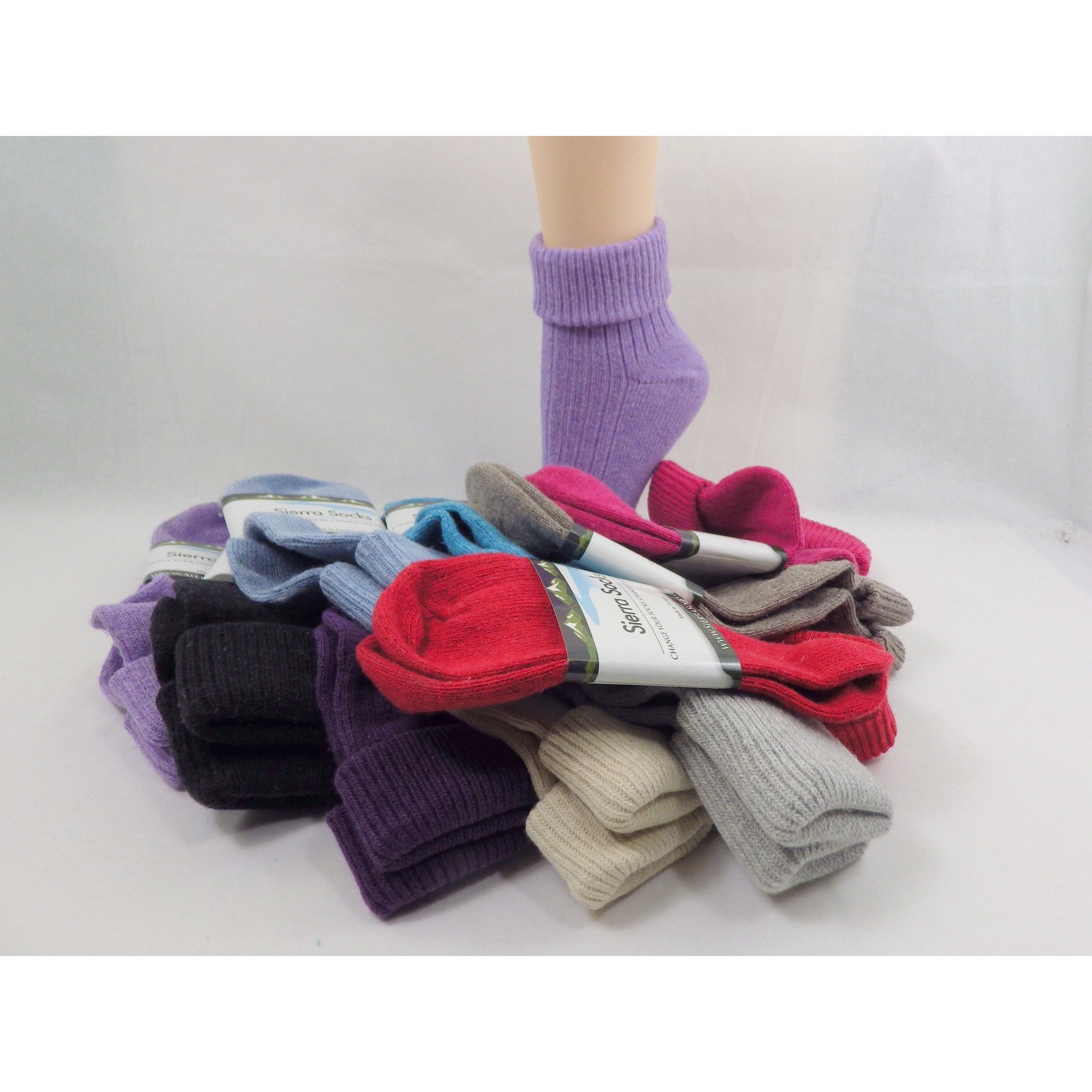 A pair of women's wool/cotton blend turncuff socks featuring a seamless toe design, available in various fashionable colors.