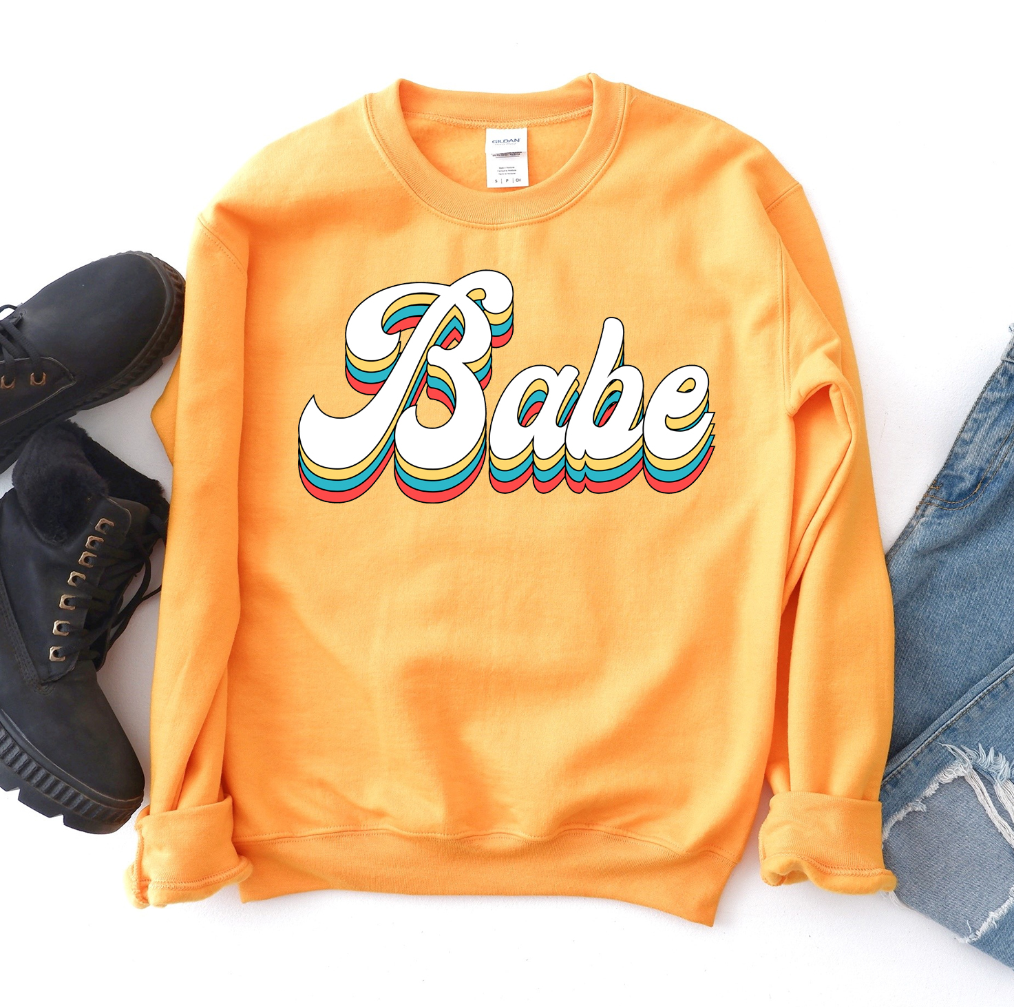 Babe Sweatshirt in a cozy unisex design, featuring a crew neck and soft fabric.