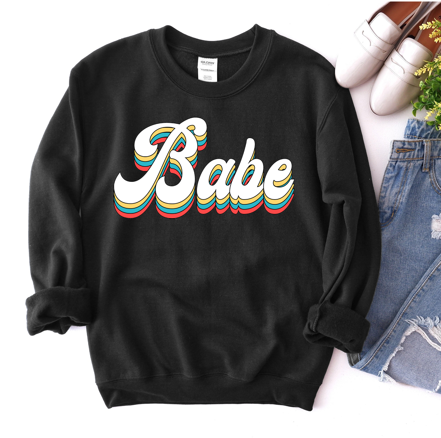 Babe Sweatshirt in a cozy unisex design, featuring a crew neck and soft fabric.