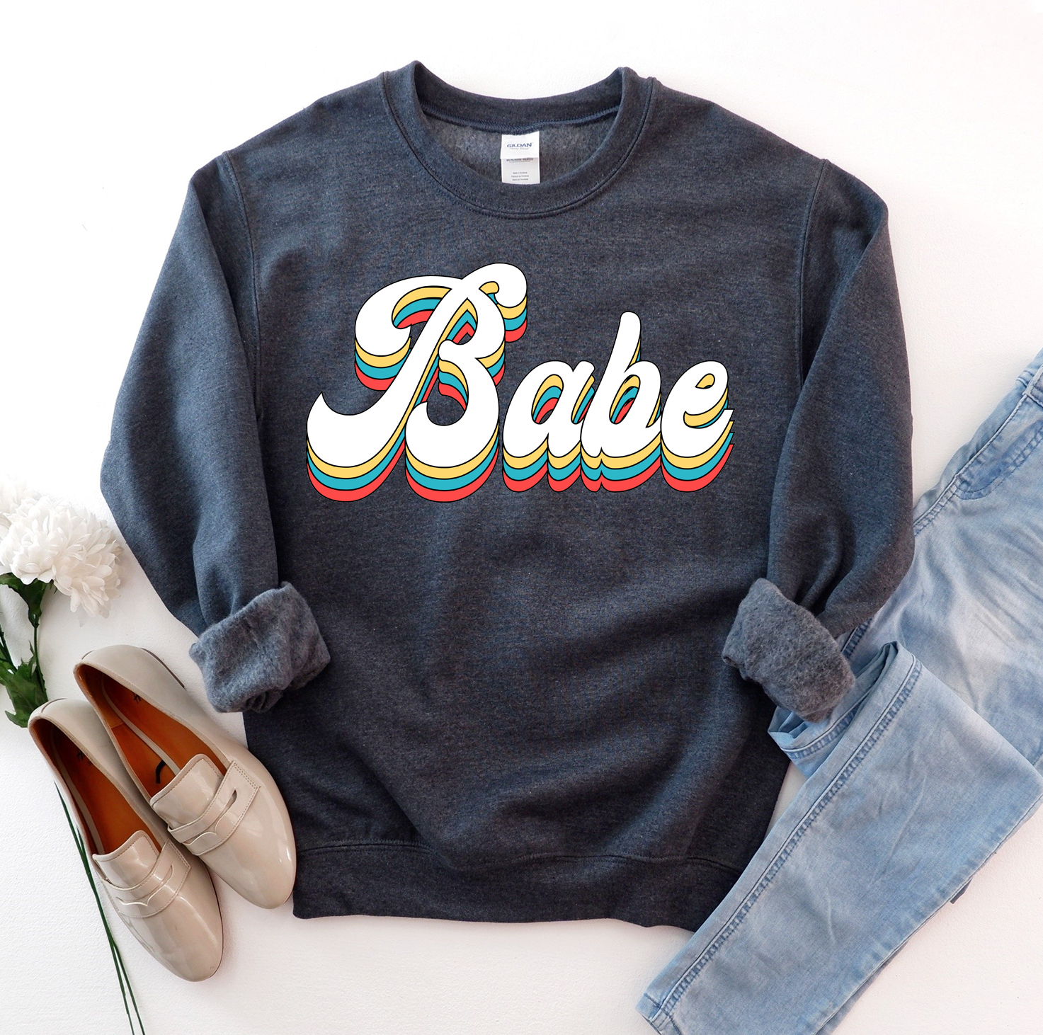 Babe Sweatshirt in a cozy unisex design, featuring a crew neck and soft fabric.