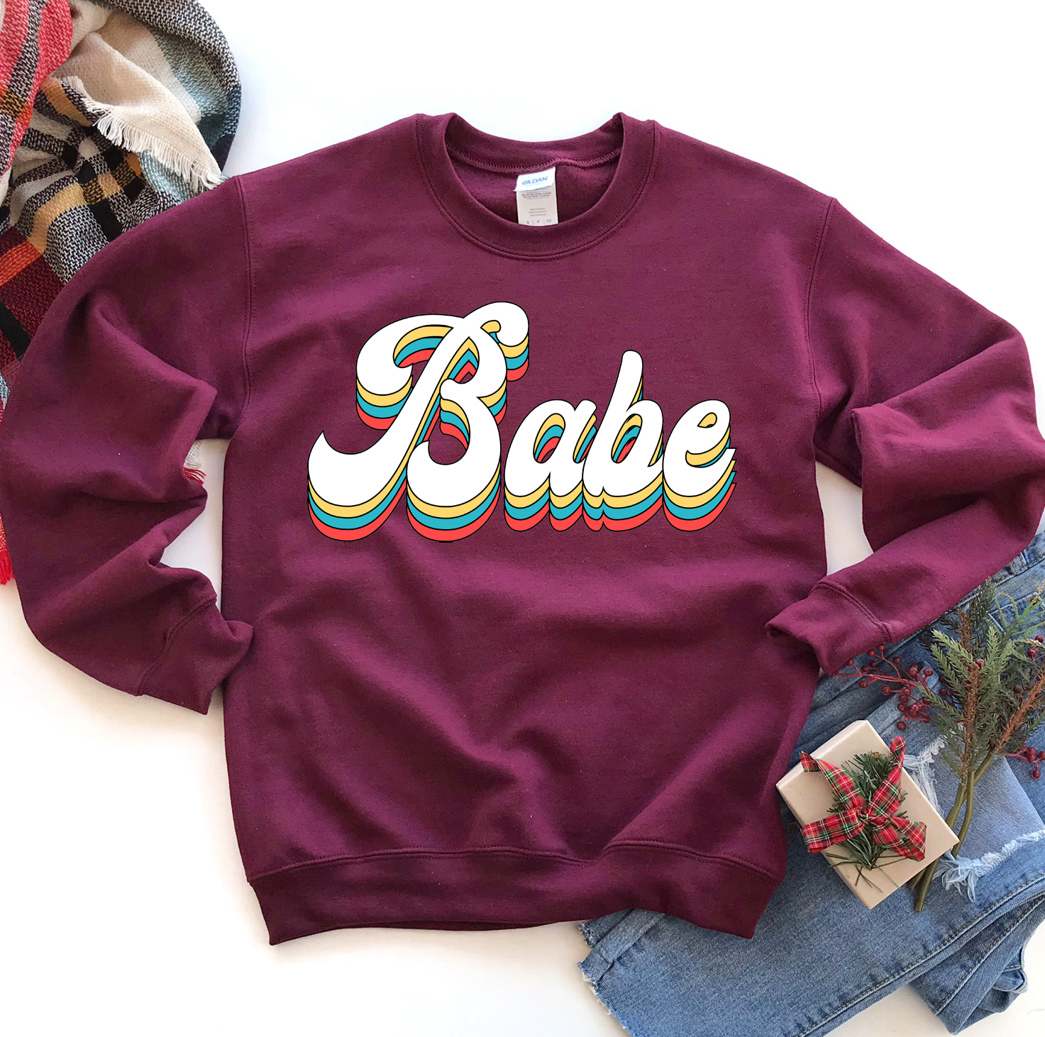 Babe Sweatshirt in a cozy unisex design, featuring a crew neck and soft fabric.