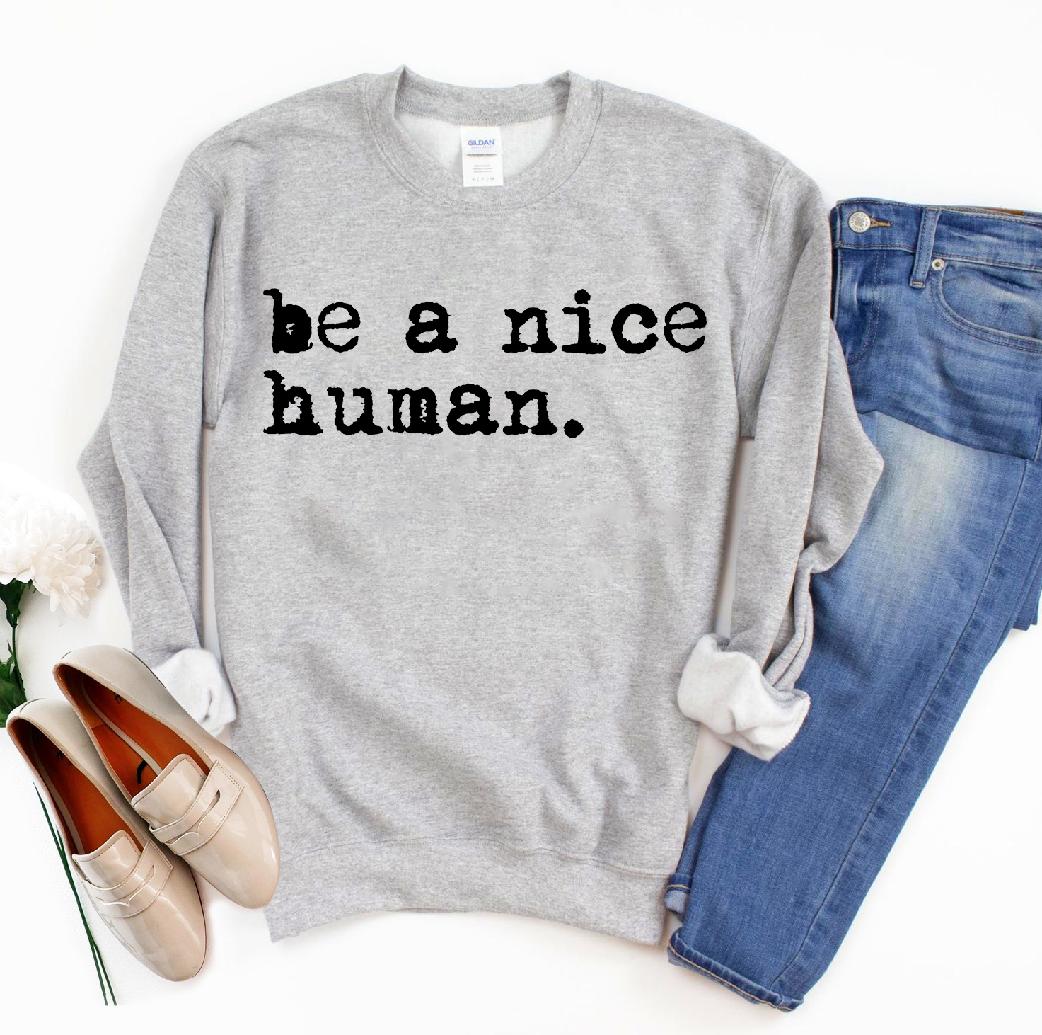 Be A Nice Human Sweatshirt in a soft fabric blend, featuring a crew neck and rib-knit collar, perfect for casual wear.