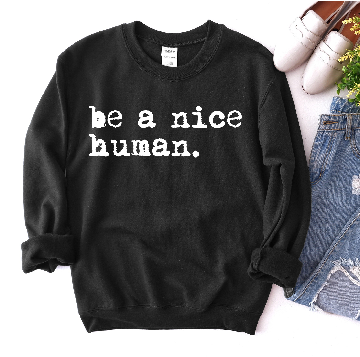 Be A Nice Human Sweatshirt in a soft fabric blend, featuring a crew neck and rib-knit collar, perfect for casual wear.