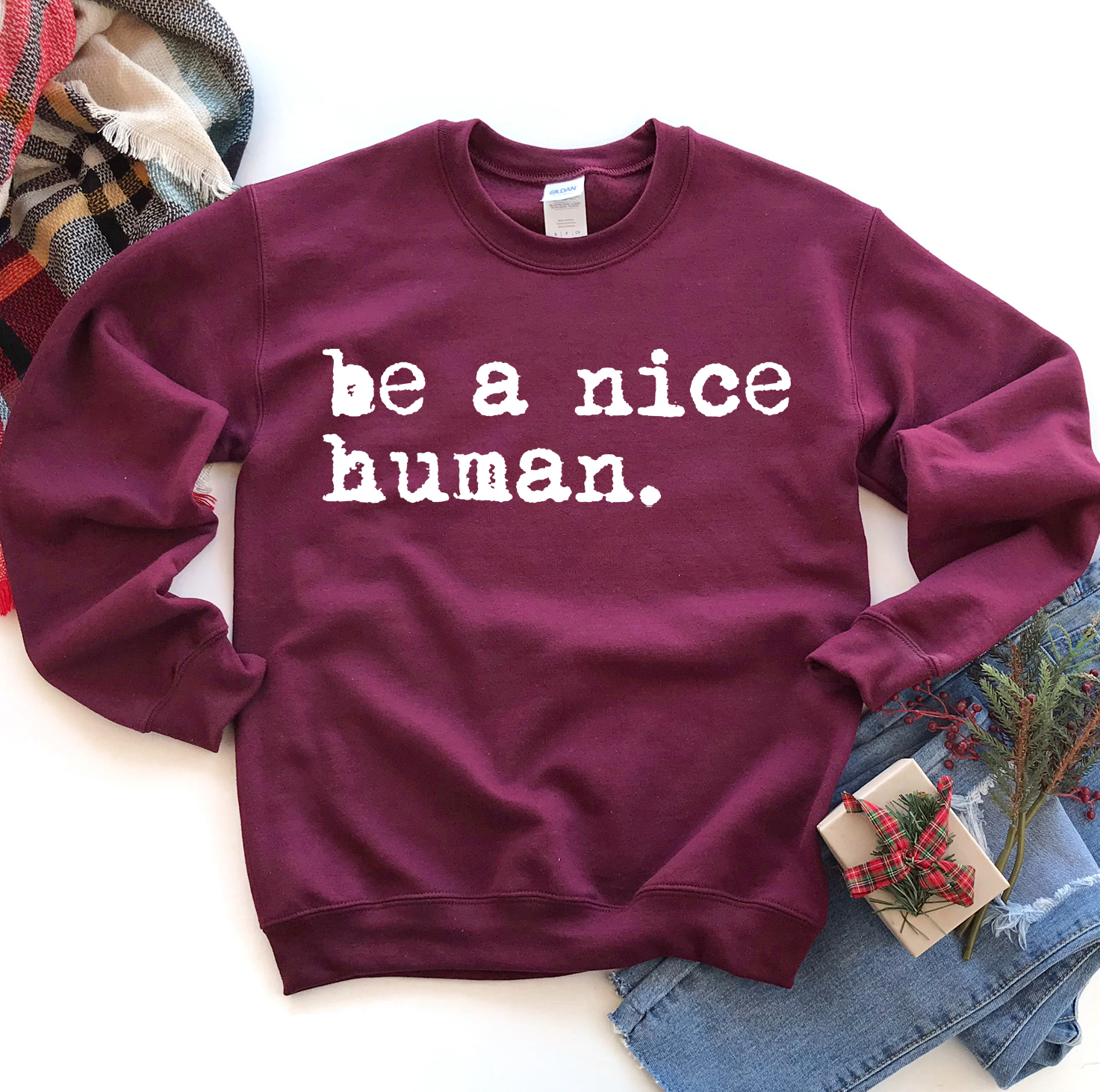 Be A Nice Human Sweatshirt in a soft fabric blend, featuring a crew neck and rib-knit collar, perfect for casual wear.