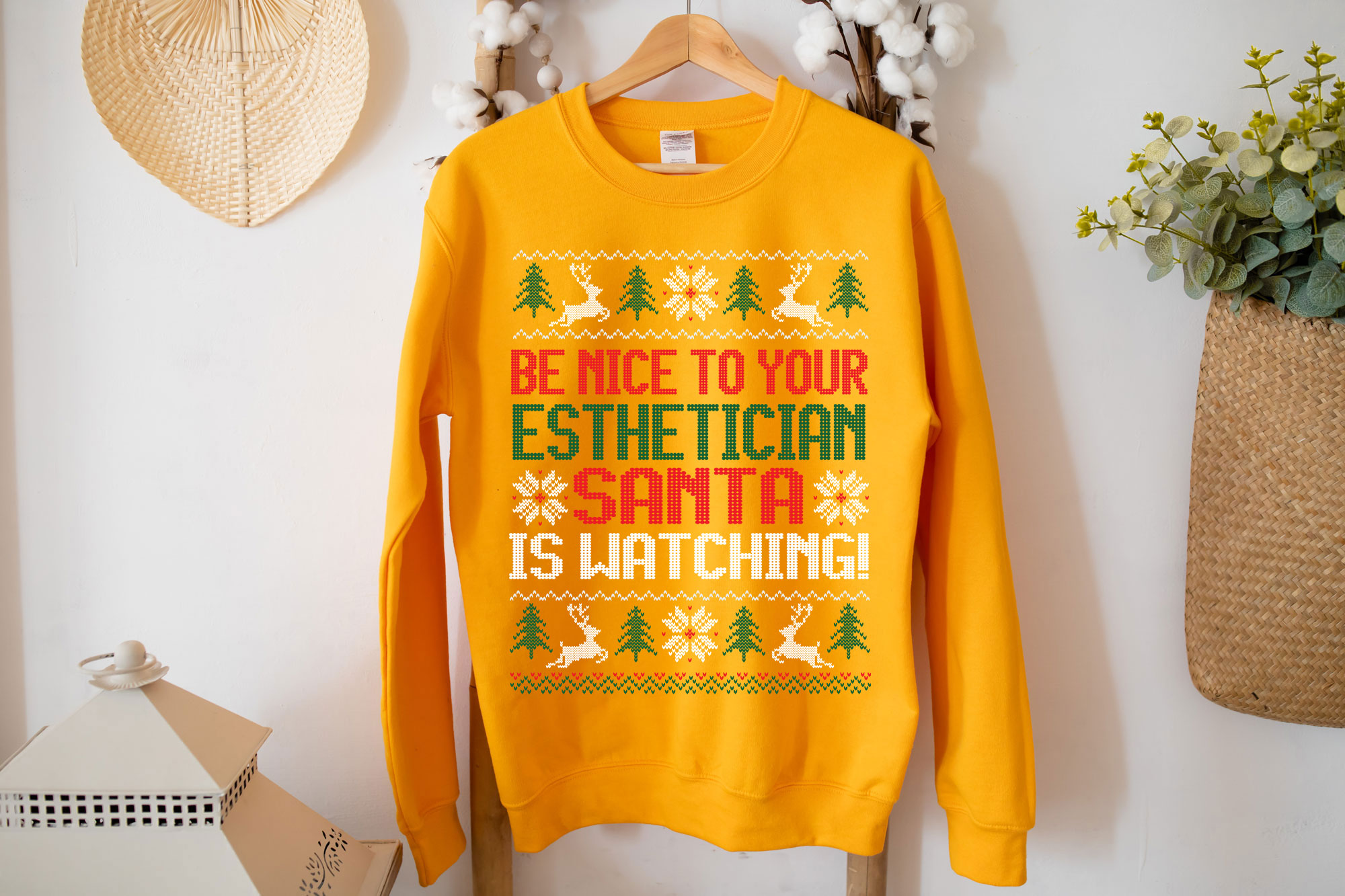 Be Nice to your Esthetician Christmas Sweatshirt featuring a festive design with Santa and playful text.