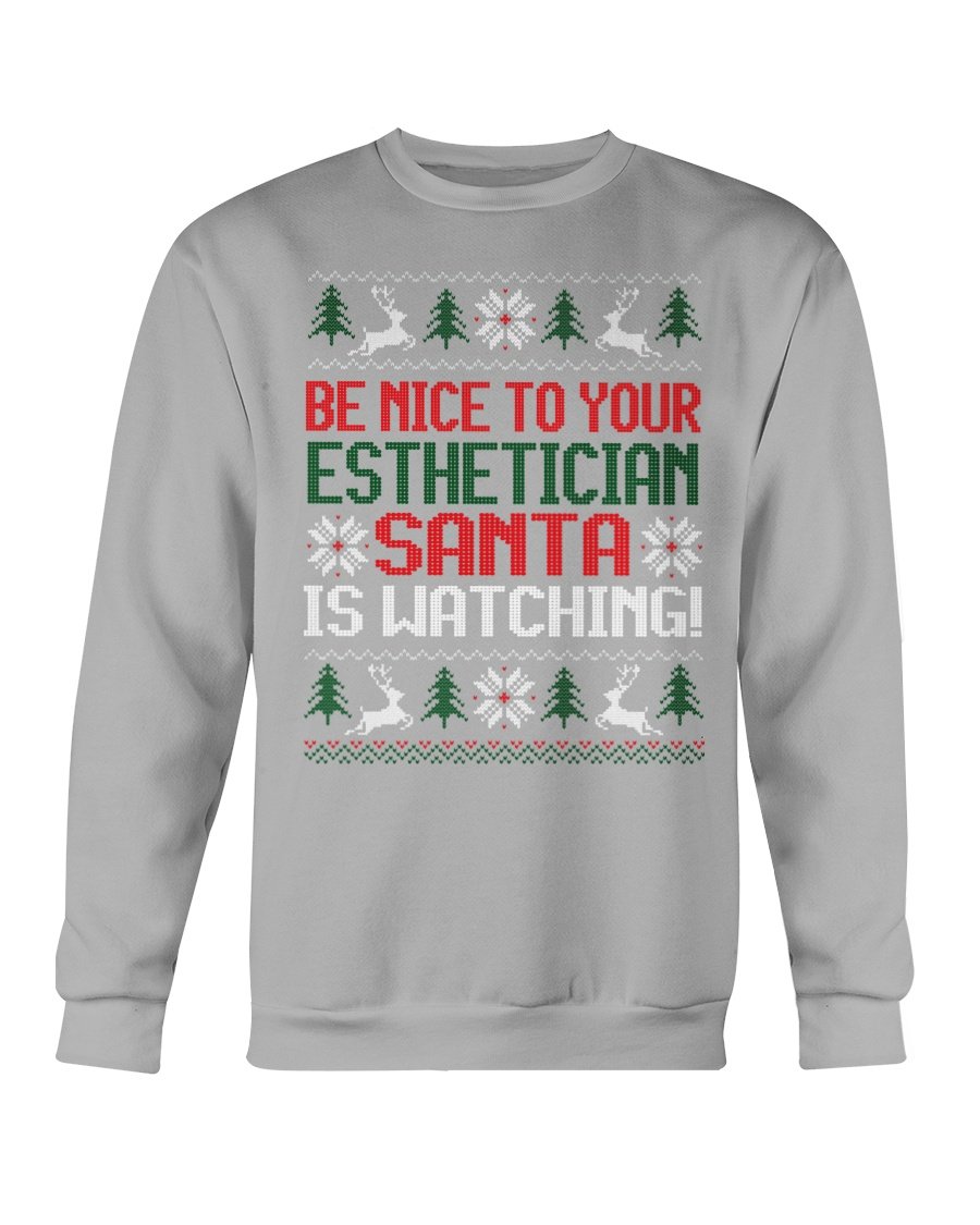 Be Nice to your Esthetician Christmas Sweatshirt featuring a festive design with Santa and playful text.