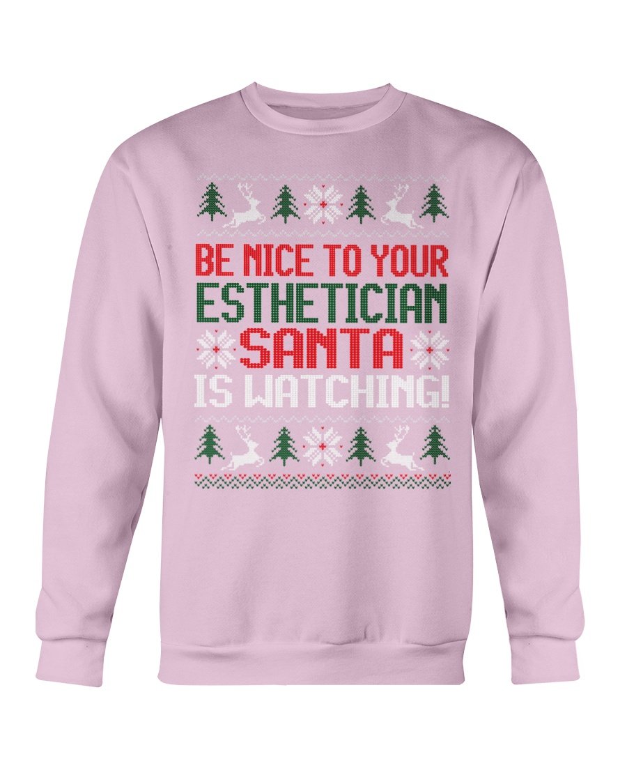 Be Nice to your Esthetician Christmas Sweatshirt featuring a festive design with Santa and playful text.