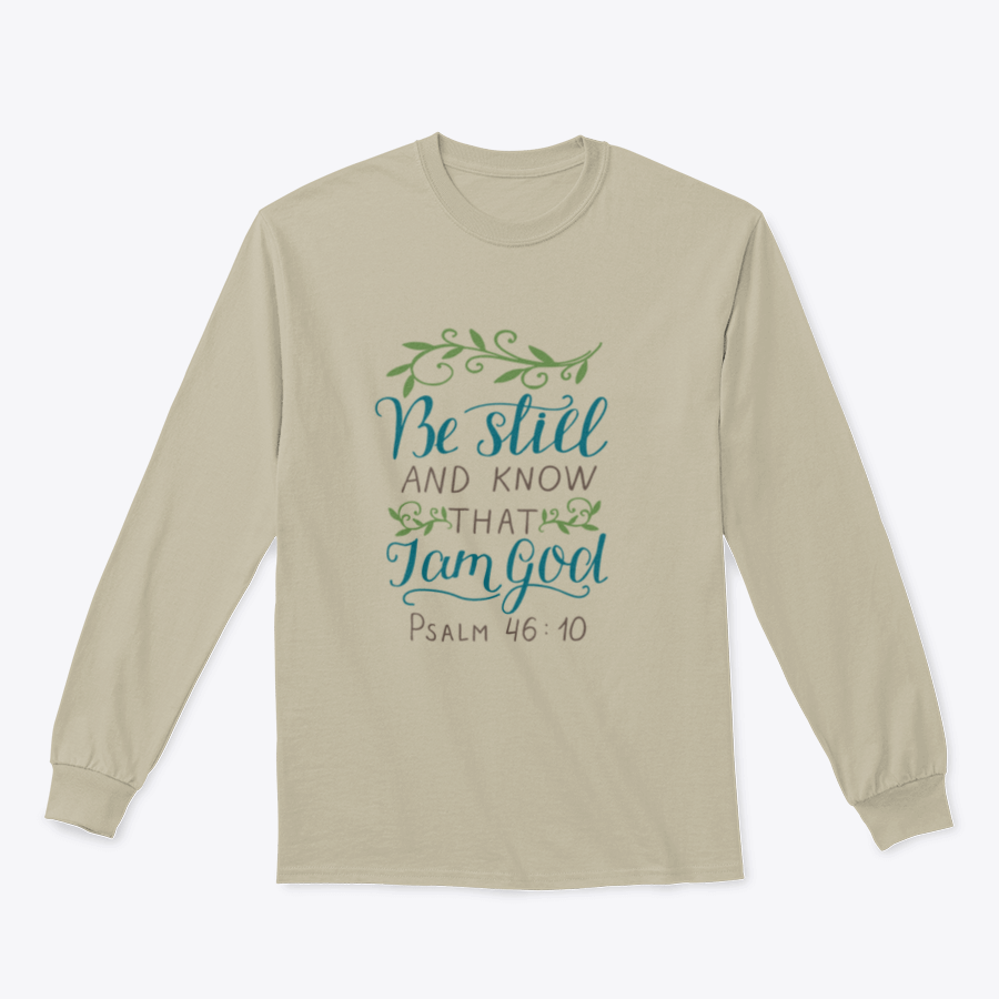 A stylish T-shirt featuring the biblical verse 'Be Still And Know, That I Am God', made from soft cotton fabric.