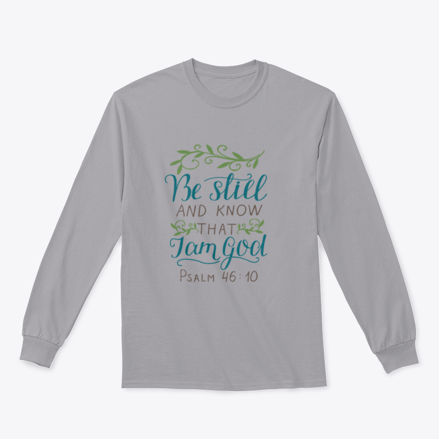 A stylish T-shirt featuring the biblical verse 'Be Still And Know, That I Am God', made from soft cotton fabric.