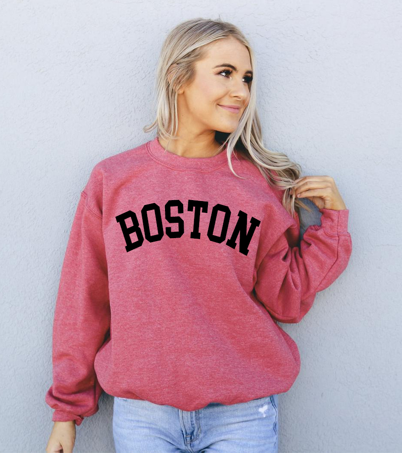 A cozy Boston Sweatshirt featuring a crew neck, made from soft air-jet spun yarn, perfect for casual wear.