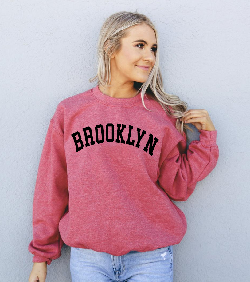 Brooklyn Sweatshirt in a cozy unisex design featuring a crew neck and soft fabric.