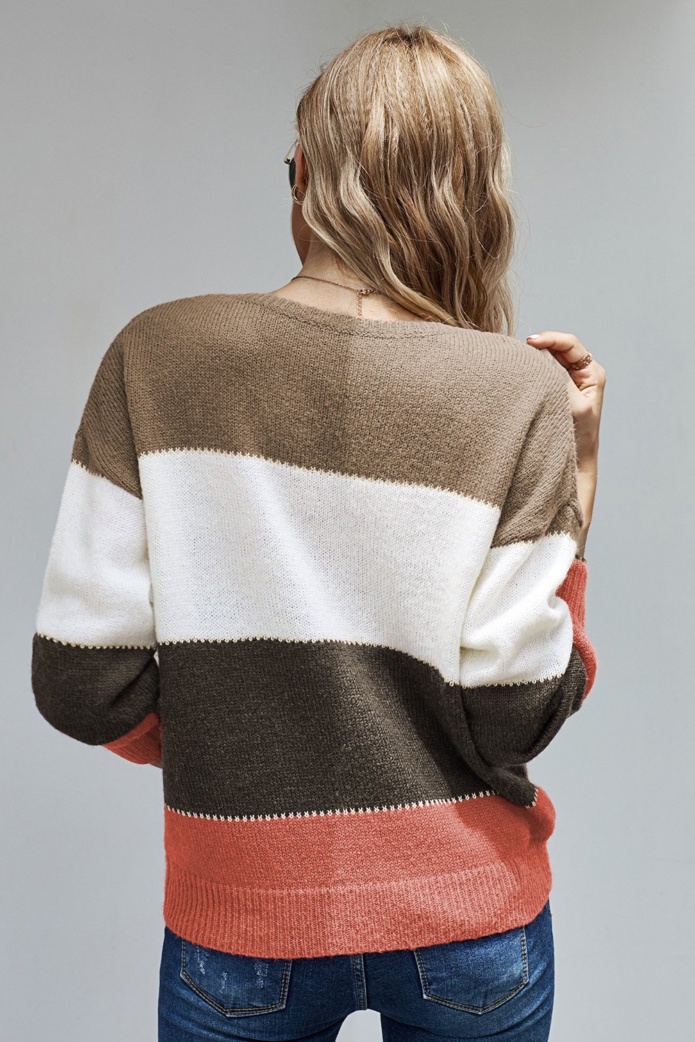 Brown pullover colorblock winter sweater featuring a stylish design with long sleeves and a loose fit, perfect for chilly days.