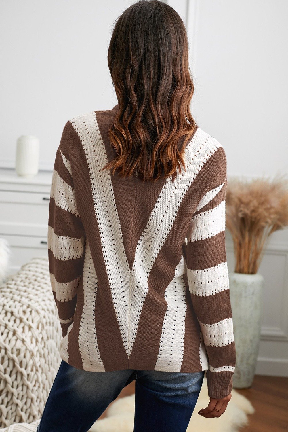 Brown and white striped v neck sweater with ribbed texture and full sleeves, showcasing an elegant neck loop design.